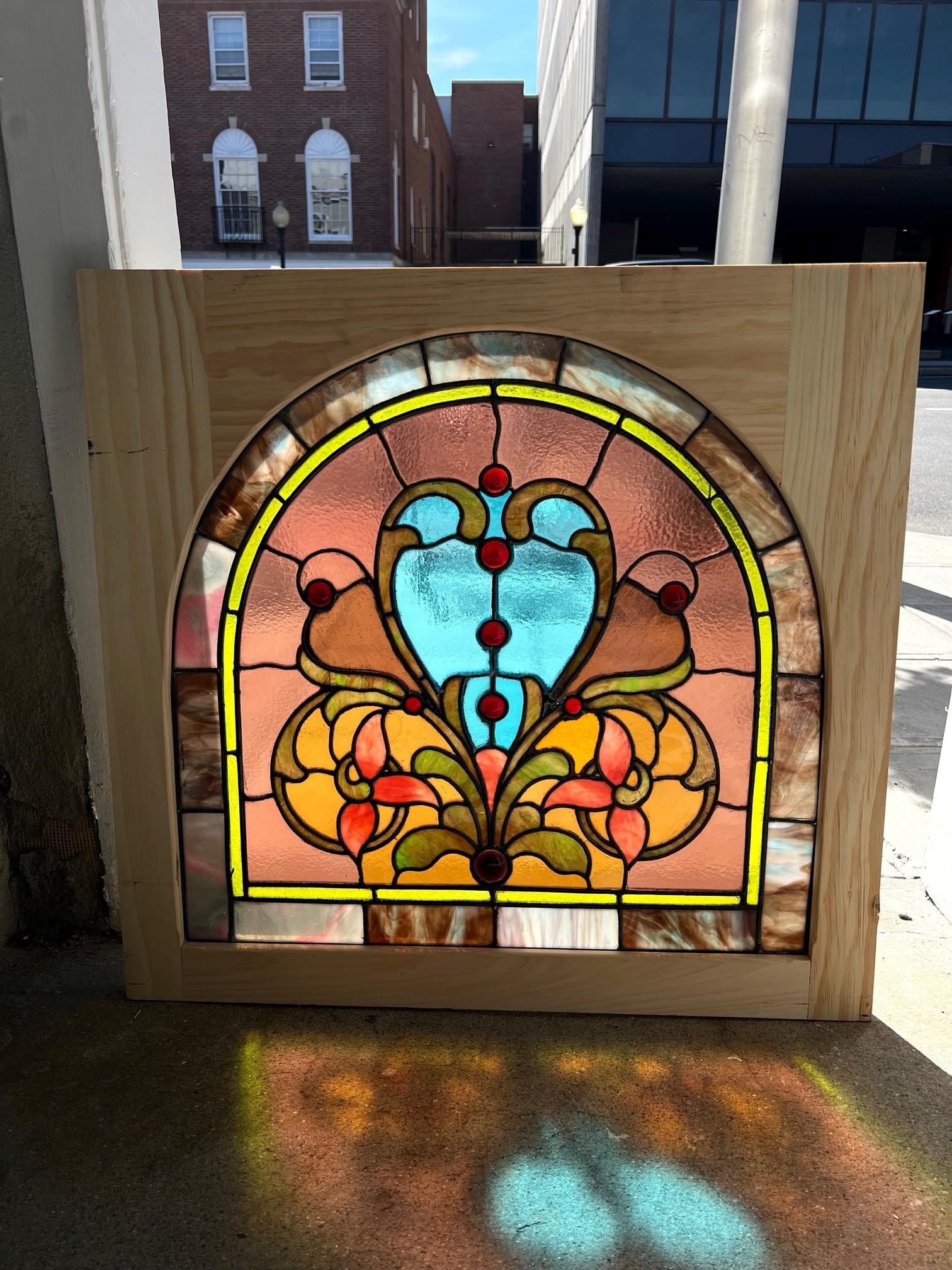 Late 19th Century Antique Arched Stained Glass Window in a New Wood Frame For Sale 11