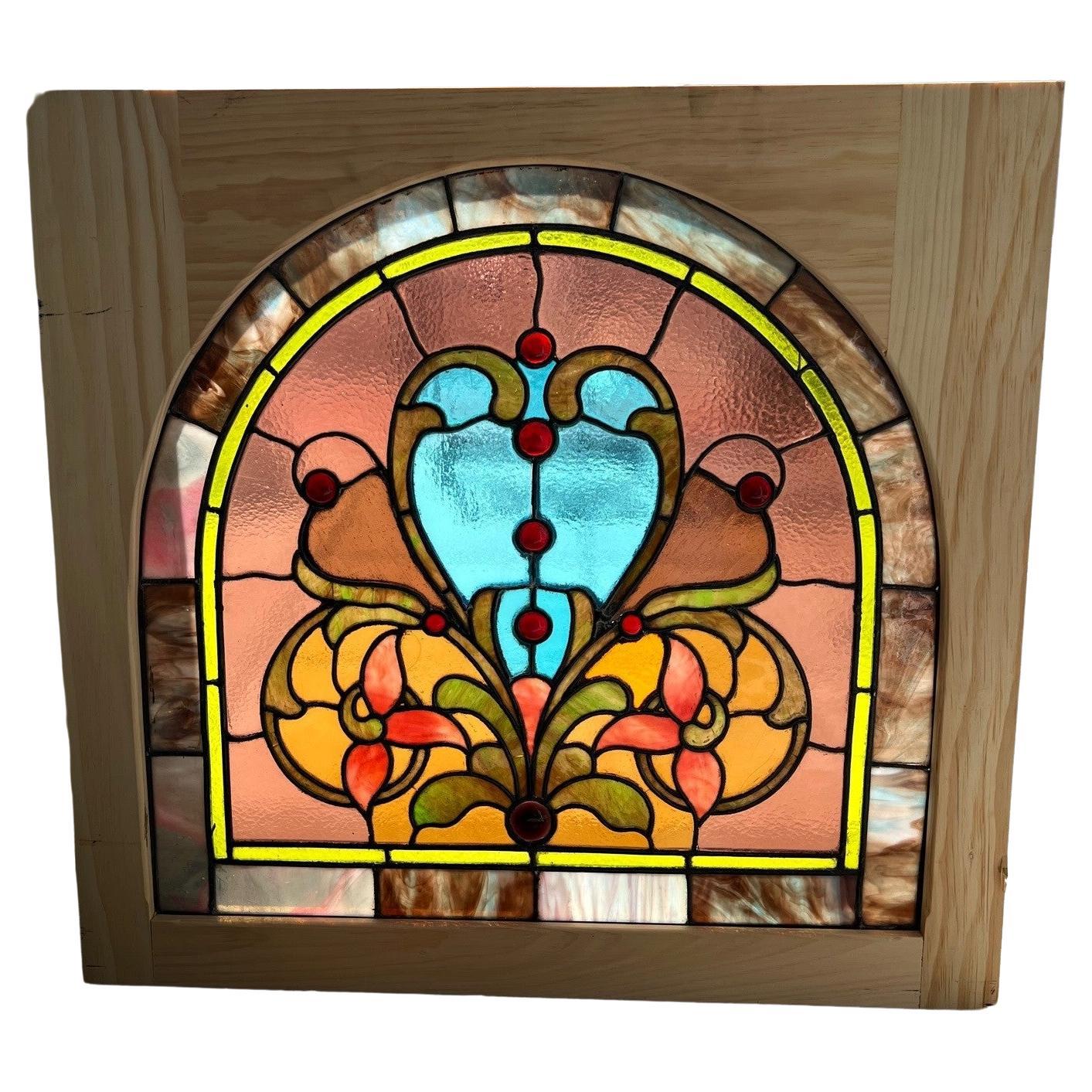 Late 19th Century Antique Arched Stained Glass Window in a New Wood Frame For Sale