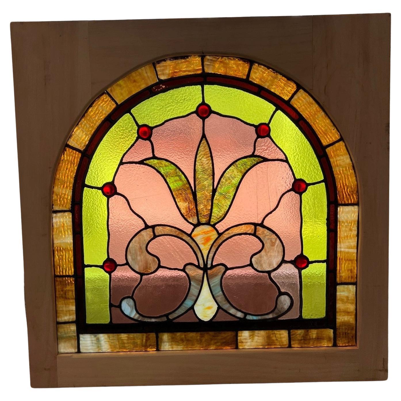 Late 19th Century Antique Arched Stained Glass Window in a New Wood Frame For Sale
