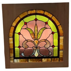 Late 19th Century Vintage Arched Stained Glass Window in a New Wood Frame