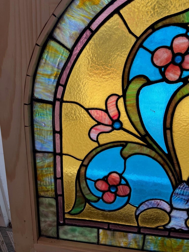 Late 19th Century Antique Arched Stained Glass Window with Flowers and Wood Frame For Sale at