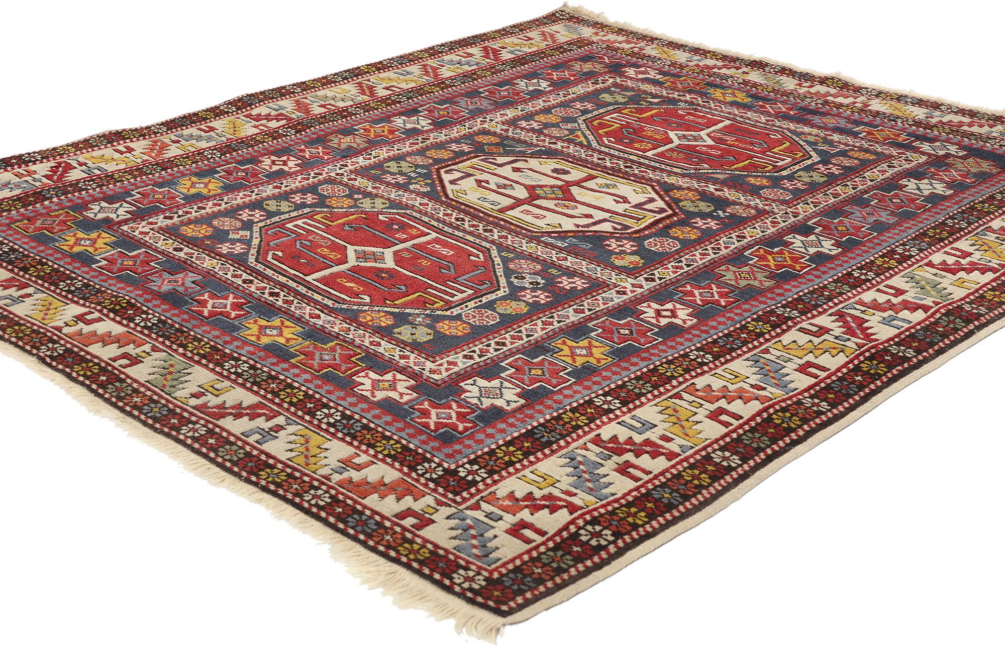 78813 Antique Caucasian Kazak Rug, 04'04 x 05'01. With roots deep in Kazakh culture and originating from the Caucasus region, Caucasian Kazak rugs embody a legacy of meticulous craftsmanship. Admired for their vibrant hues of red, blue, and green,