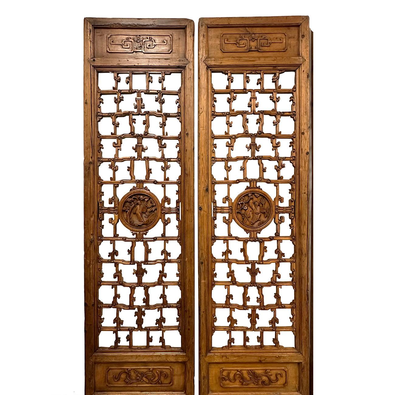A set of six Chinese Qing Dynasty period large carved wood interior door panels from the late 19th century, with fretwork design, Created in China during the Qing Dynasty in the later years of the 19th century, each of this set of six of large