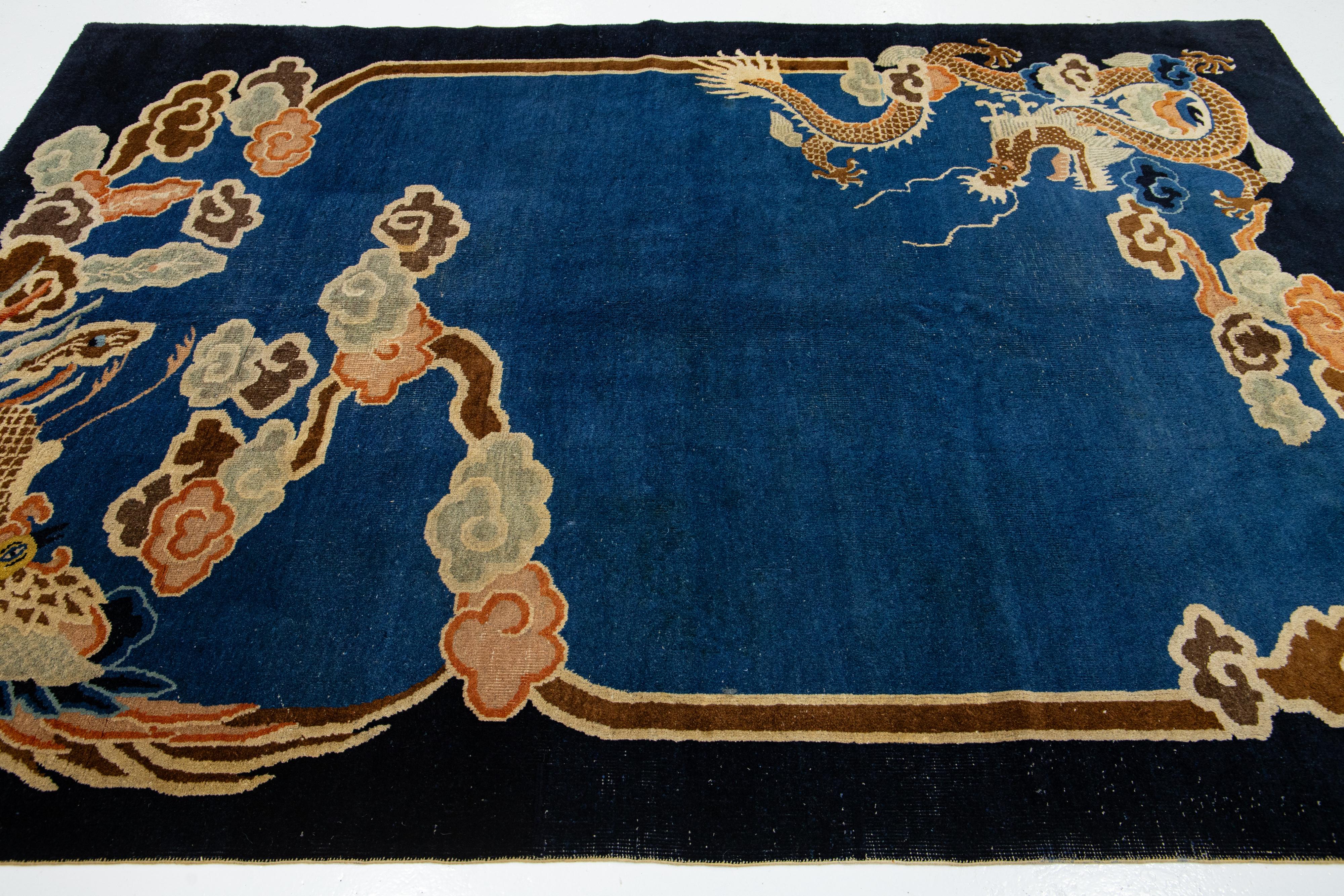 Art Deco Late 19th Century Antique Chinese Peking Blue Dragon Motif Wool Rug For Sale