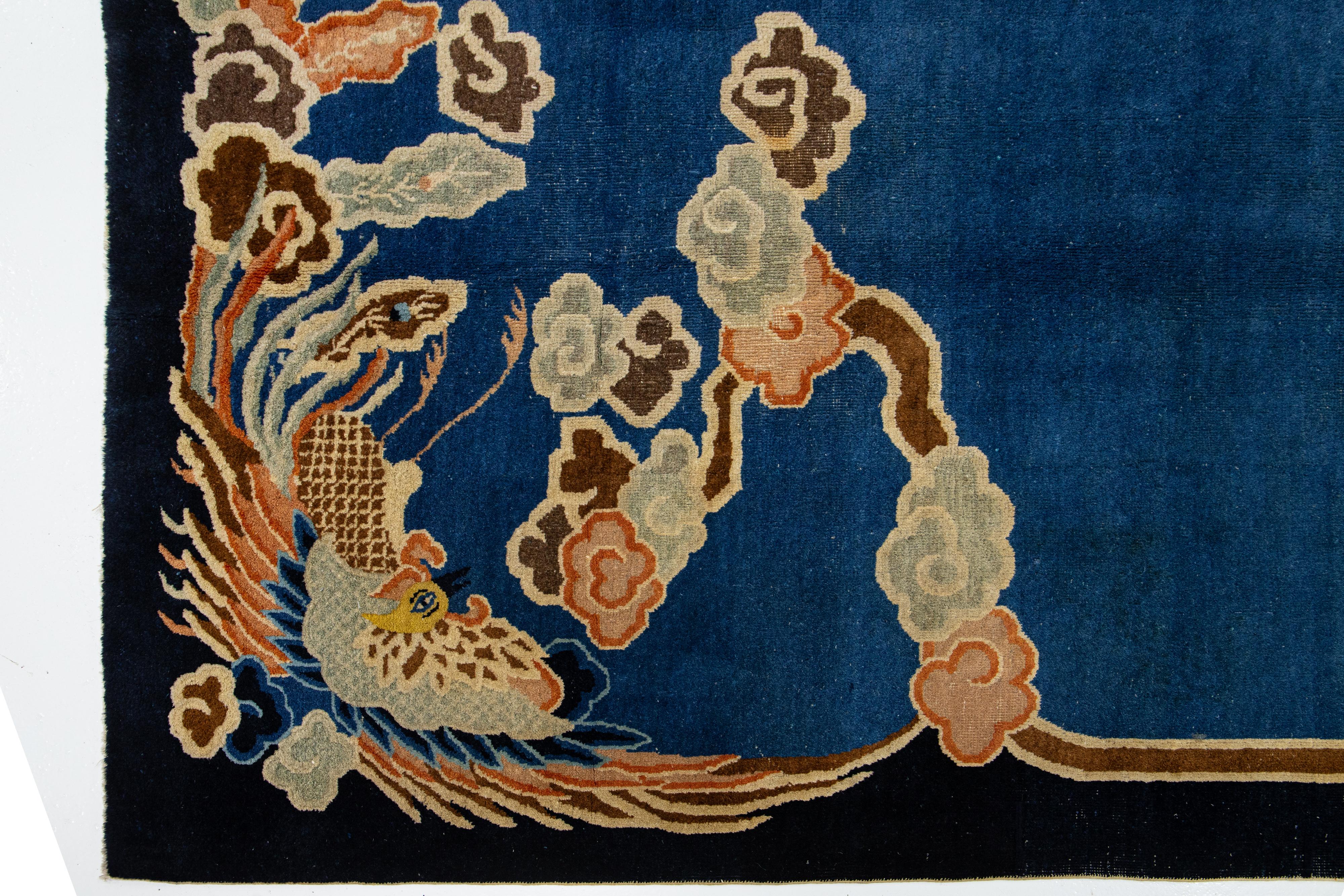 Hand-Knotted Late 19th Century Antique Chinese Peking Blue Dragon Motif Wool Rug For Sale