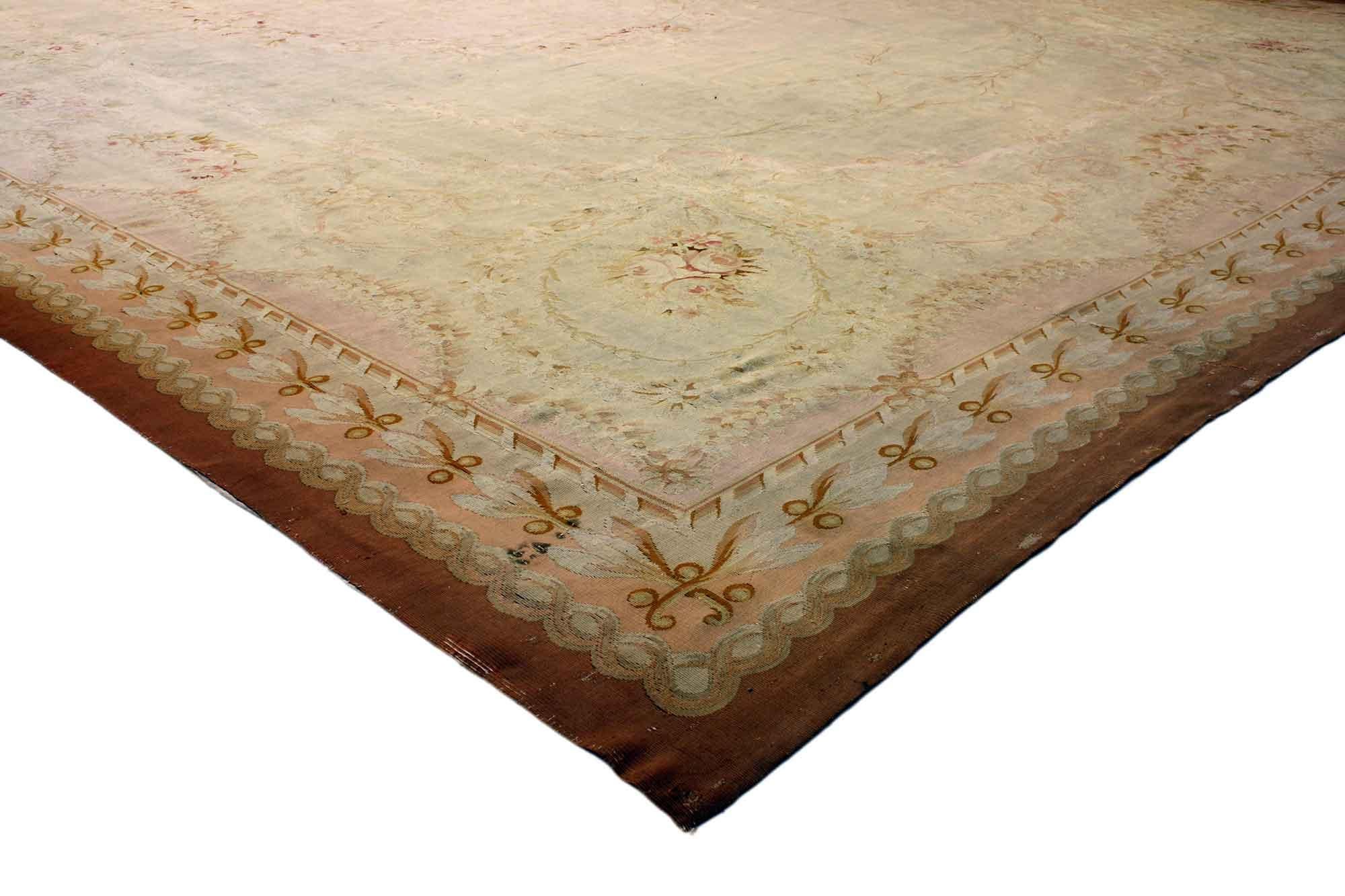 76845 late 19th century antique French Aubusson rug with Romantic Rococo Style. With bountiful Aubusson roses and French Provincial style, this Late 19th Century Antique French Aubusson palace rug was spared no expense. A decorative centre medallion