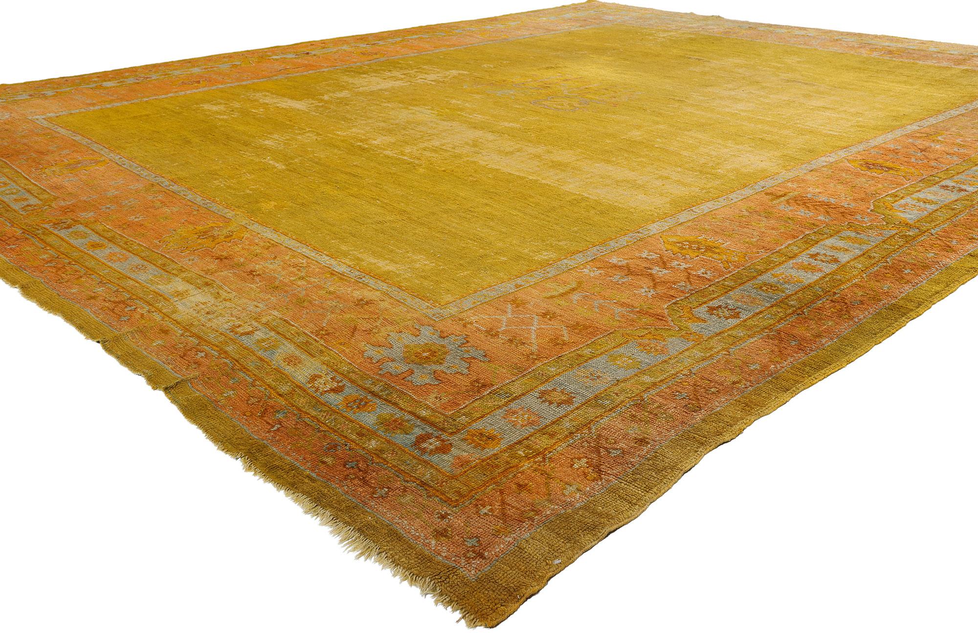 78742 Distressed Antique-Worn Turkish Gold Oushak Rug, 12'02 x 15'00. Originating from the Western region of Oushak in Turkey, Turkish Oushak rugs have earned widespread admiration for their intricate designs, soft color palettes, and premium wool