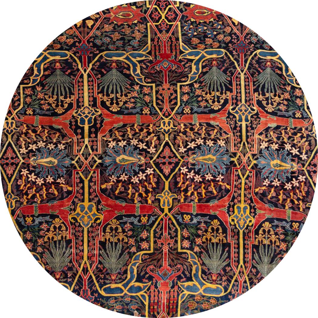Beautiful antique Bidjar rug, hand knotted wool with a navy blue field, red and yellow accents in an all-over Classic motif,
circa 1870.
This rug measures 19' 0