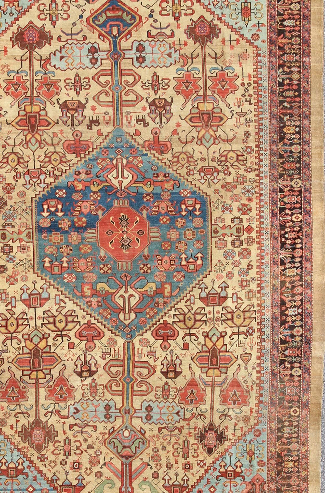 Hand-Knotted 19th Century Antique Persian Bakshaish Rug in Gold, Blue and Multi colors For Sale