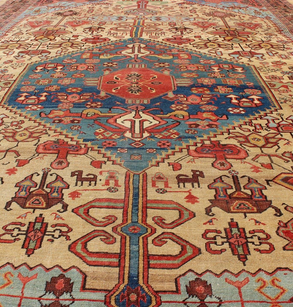 Late 19th Century 19th Century Antique Persian Bakshaish Rug in Gold, Blue and Multi colors For Sale
