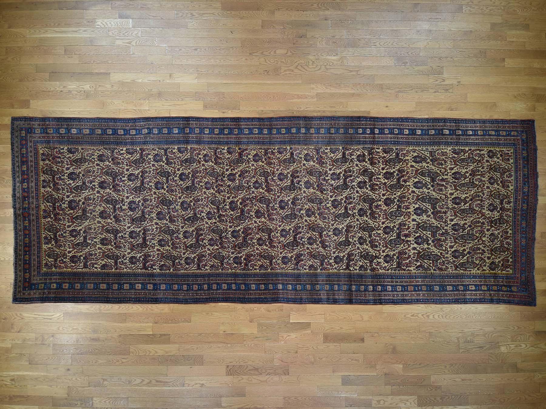 This is a genuine hand knotted oriental rug. It is not hand tufted or machine made rug. Our entire inventory is made of either hand-knotted or hand-woven rugs.

Decorate your home with this high quality hand knotted yellow antique bidjar, is an