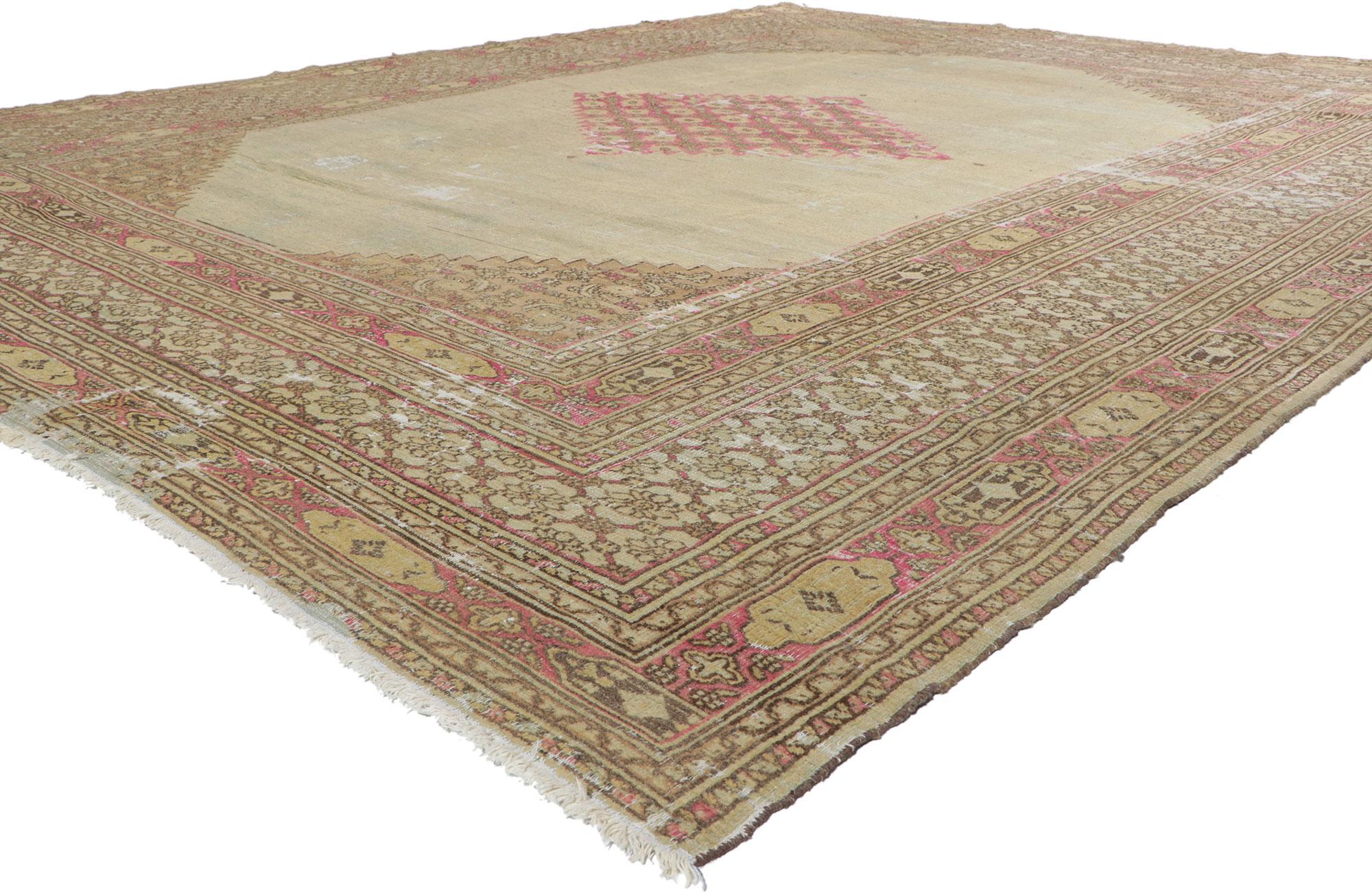 73072 Late 19th Century Distressed Antique Persian Khorassan Rug with English Manor Style 09'10 x 12'07. With its soft, subtle hues and cozy simplicity, this hand knotted wool distressed antique Persian Khorassan rug charms with ease and beautifully