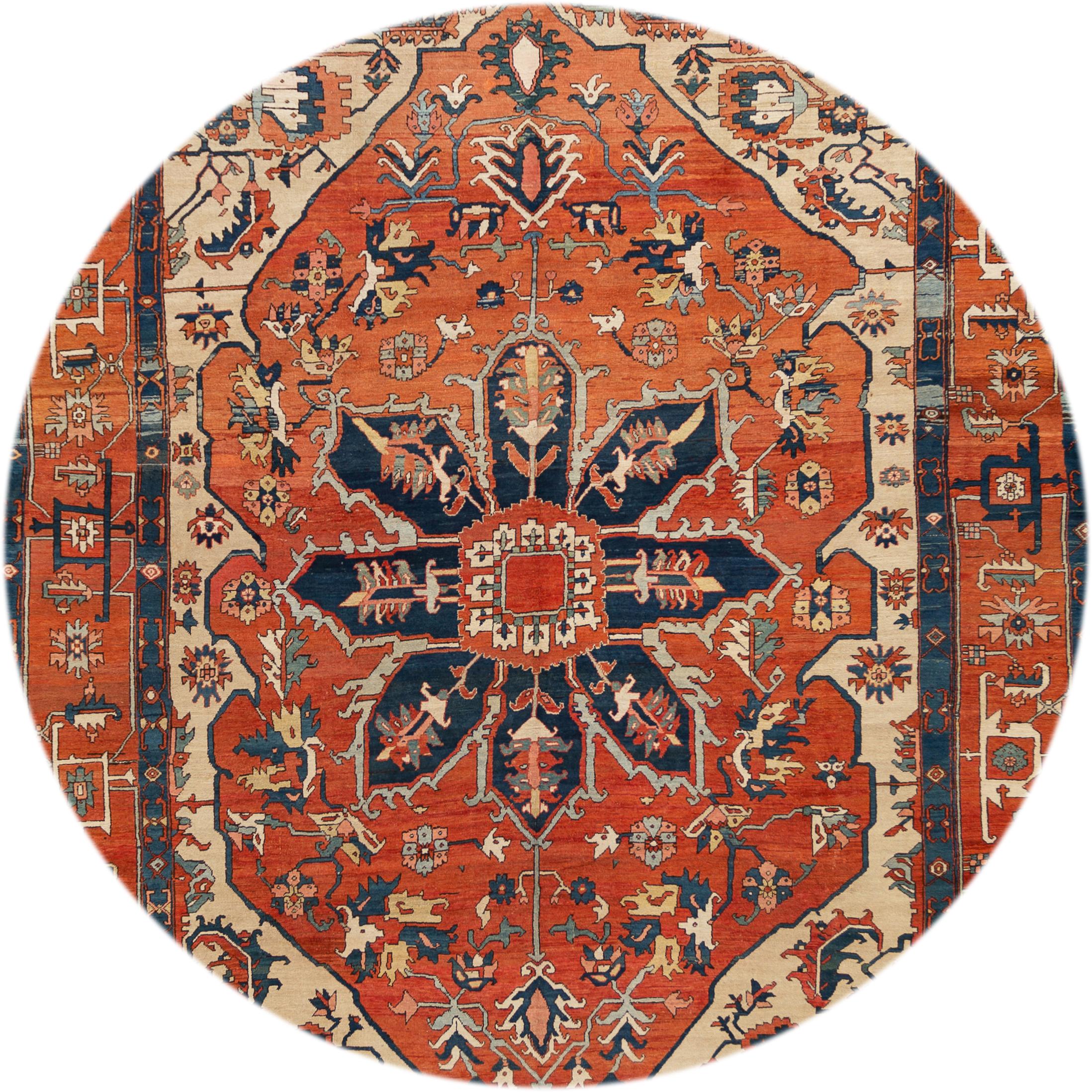 Beautiful antique Persian Serapi rug, hand knotted wool with a rust orange field, blue and ivory accents in all-over center medallion design, circa 1880
This rug measures 10' x 13'.
  