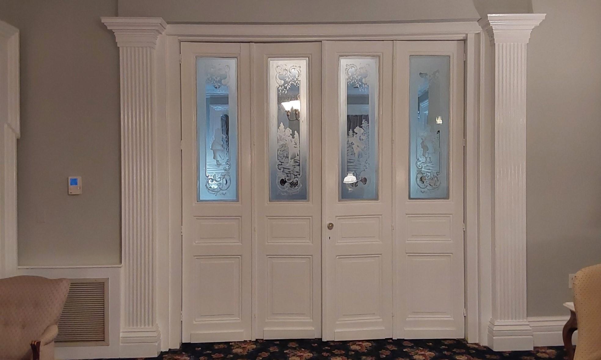 Late 19th Century antique set of four acid etched glass doors the Four Seasons. Original salvaged from an estate in France, this is a amazing set of four bifold doors each with one of the four seasons. Each acid etched glass door shows a beautiful