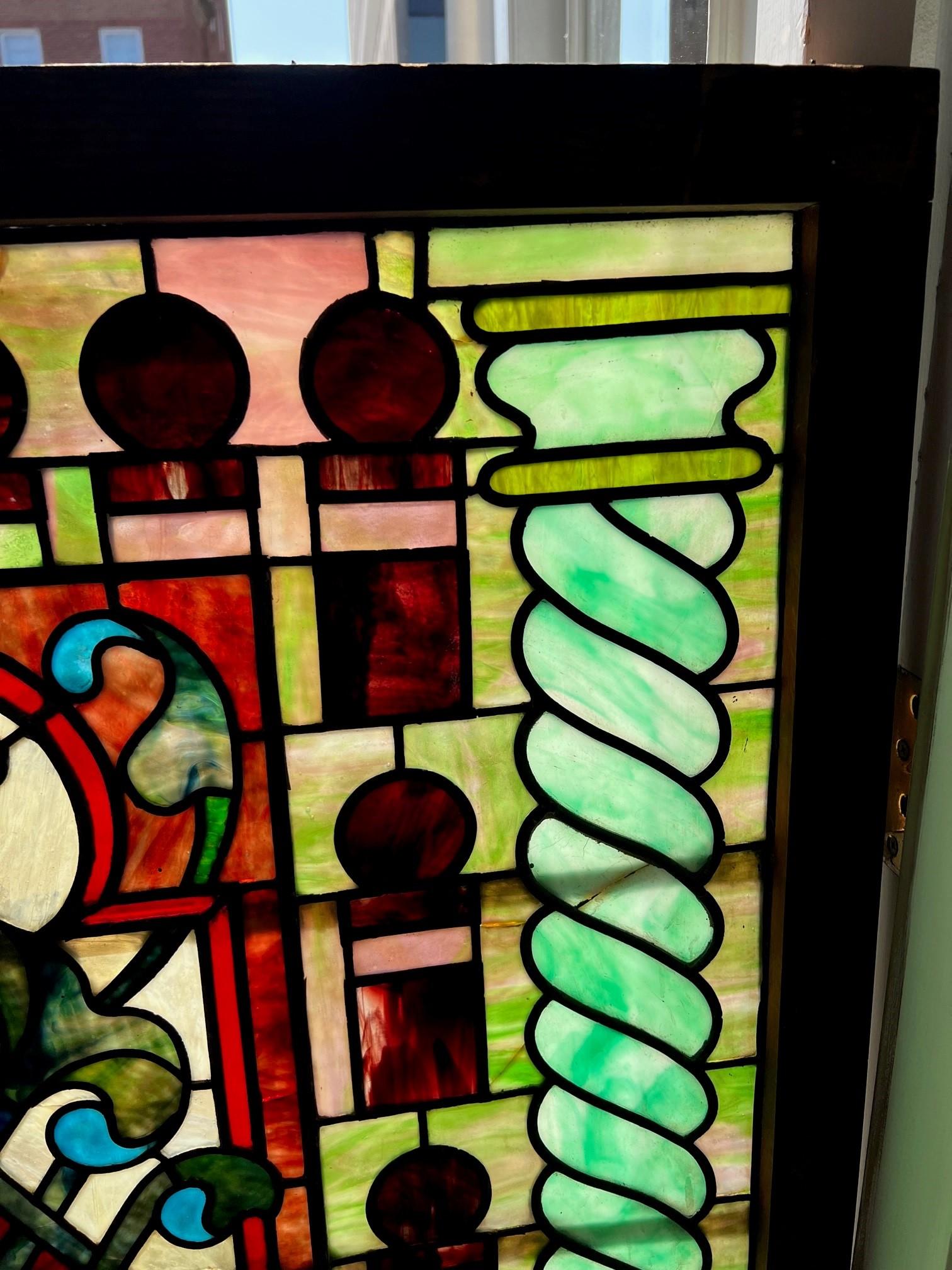 Beautiful late 19th Century antique stained glass window from a Connecticut estate. This window has great colors that look amazing in the sunlight. Not sure where the stained glass was originally, but its a very interesting window with the twisted
