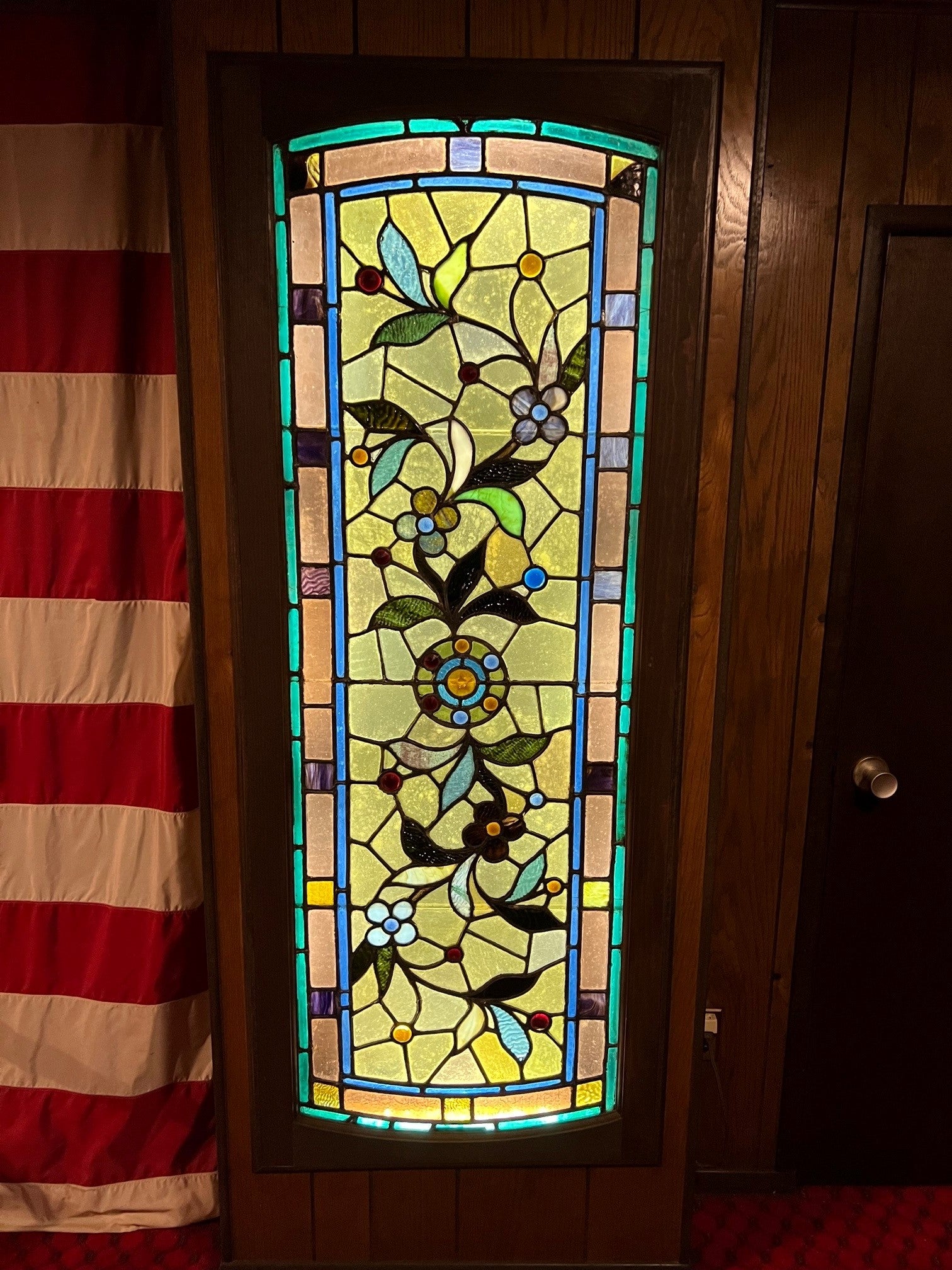 Beautiful late 19th century antique stained glass window with flowers and jewels. This is a great window with good colors from a private billiards room in Fairfield County Ct. Original salvaged from an estate in northern New Jersey over 40 years