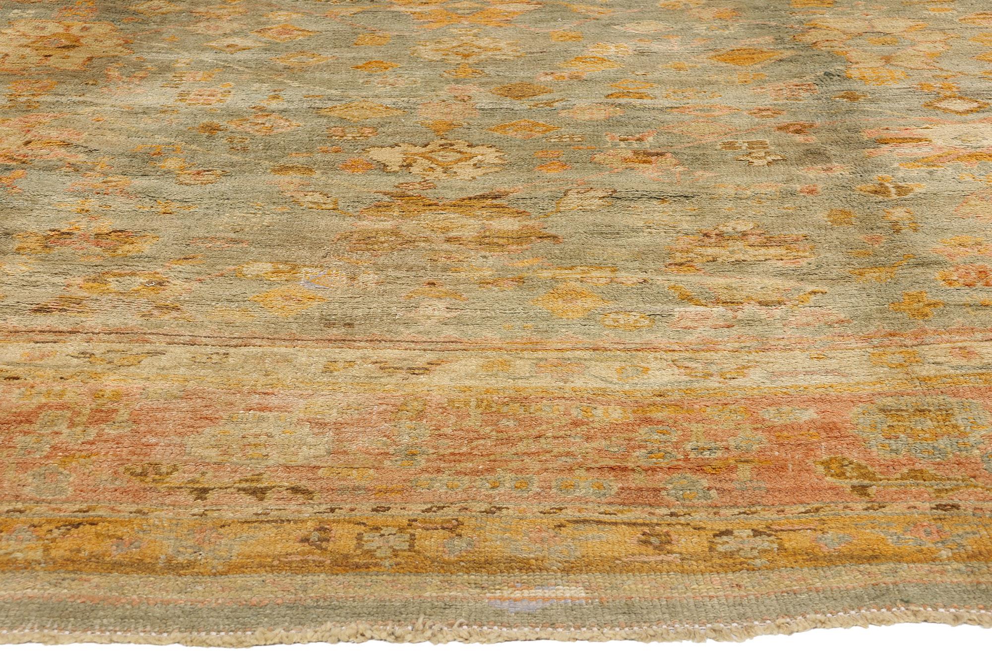 Late 19th Century Antique Turkish Oushak Rug with Time-Softened Colors In Good Condition For Sale In Dallas, TX