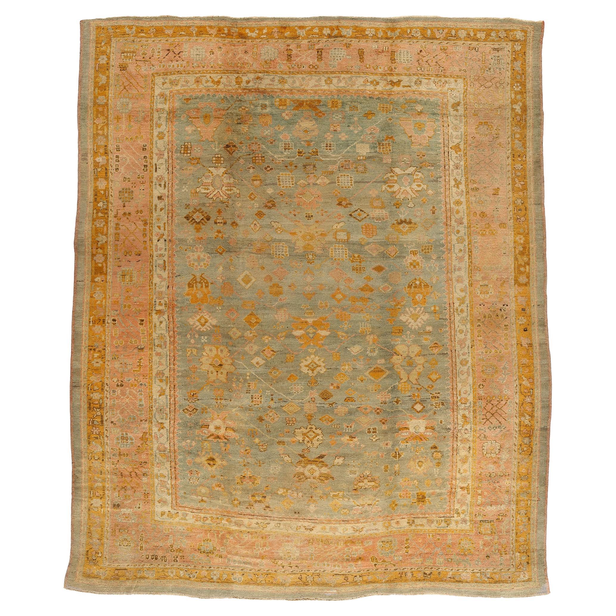 Late 19th Century Antique Turkish Oushak Rug with Time-Softened Colors For Sale