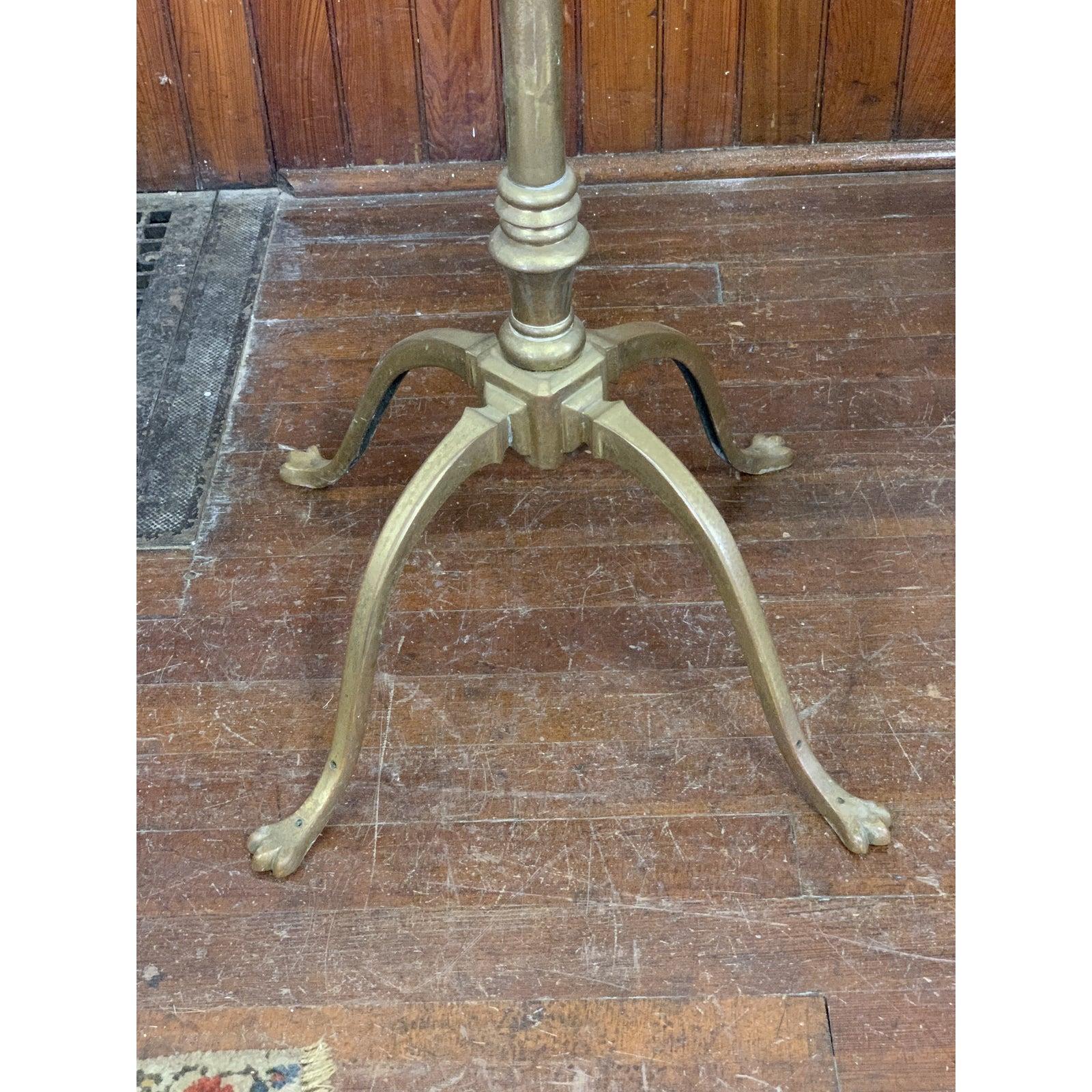 For sale is this absolutely stunning brass antique oil floor lamp made by was Benson. The lamp is in nice condition for its age. Also very well made and heavy. Gorgeous leaf design with claw feet.