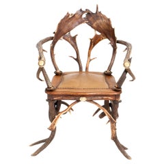 Fauteuil en bois de cervidé de la fin du 19e siècle avec assise en cuir
