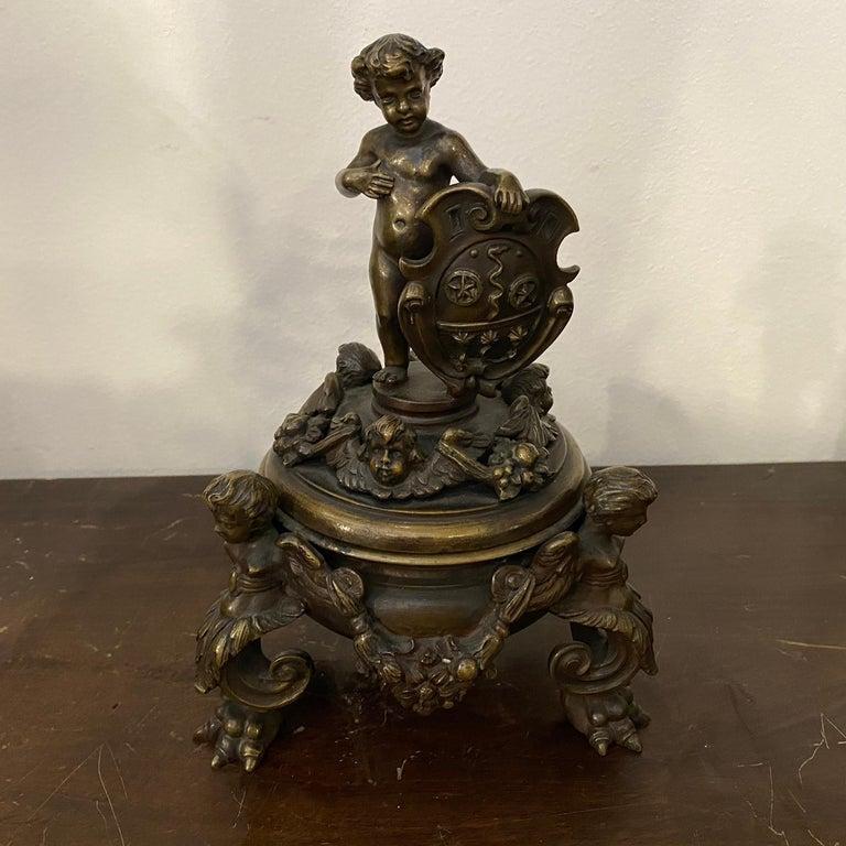 A bronze inkwell made in Milano at the end of 19th Century by famous manufacturer Antonio Pandiani (1838-1928). It's marked on the bottom. Bronze it's in original conditions and patina.