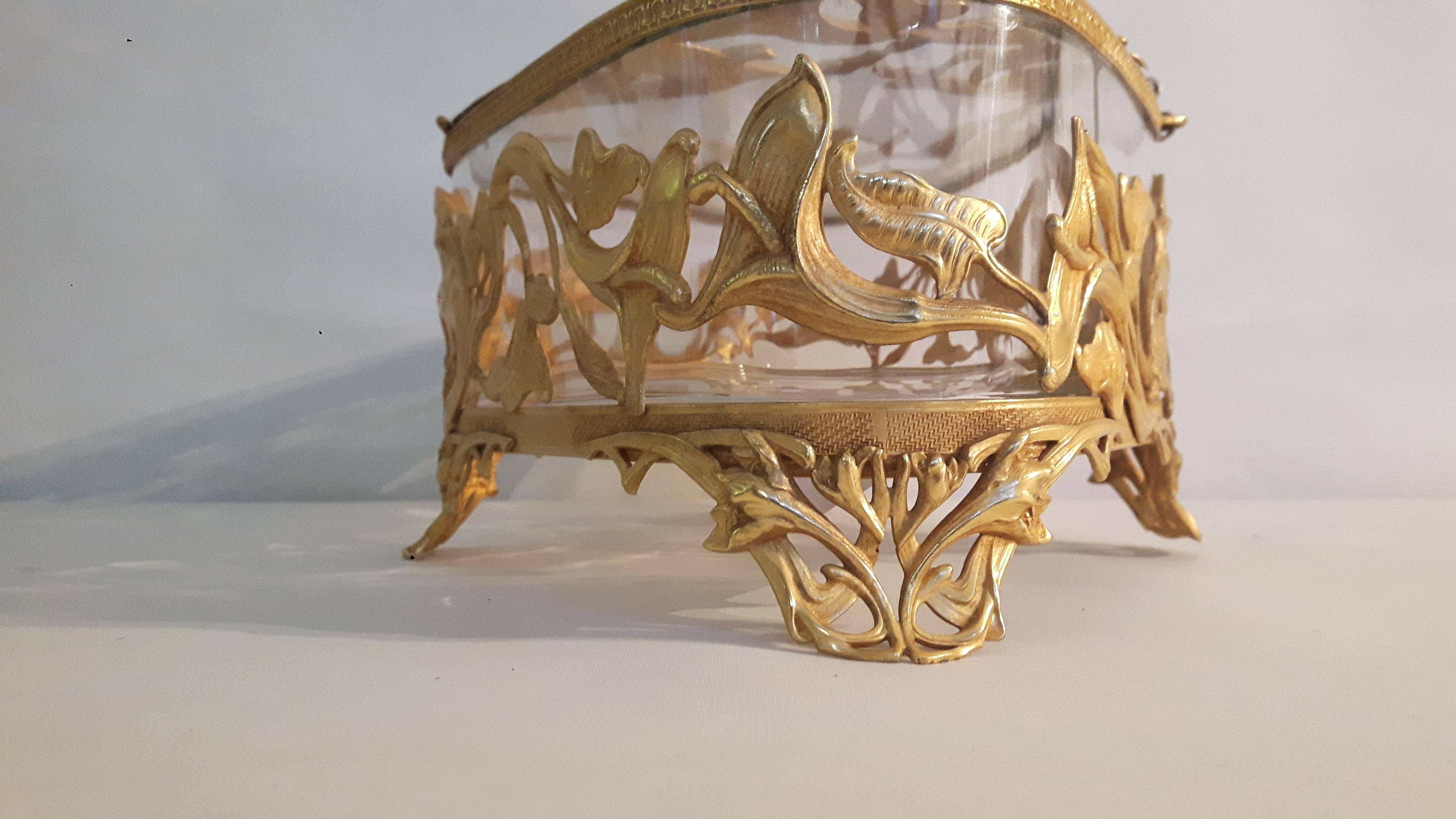 A crystal and gilt bronze art nouveau centrepiece, lozenge-shaped, probably by the Jouy or Saint Louis factory.
French, circa 1880-1890.
