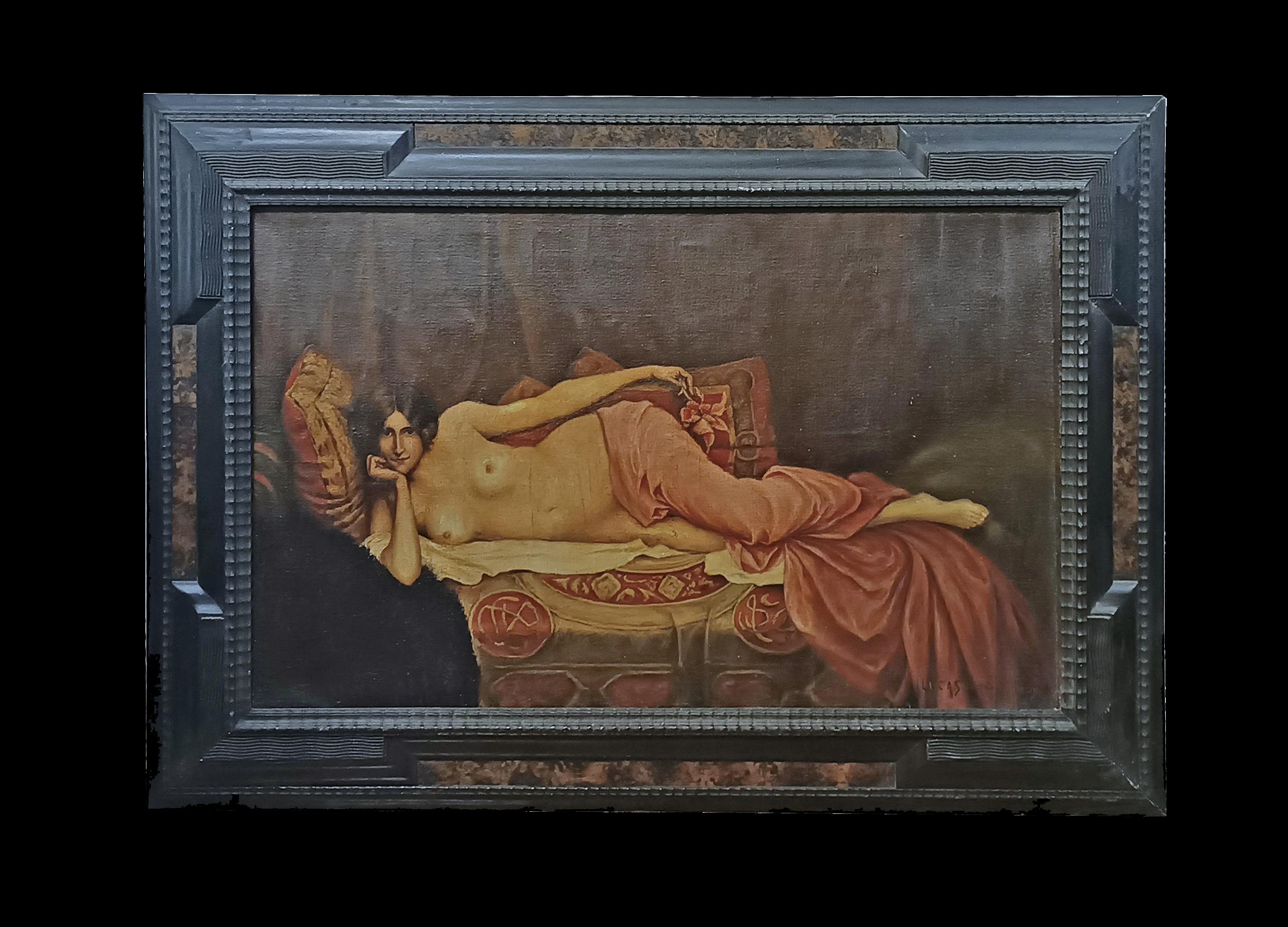 Oil painting on canvas, framed in a carved and ebonized wooden guilloché frame, enhanced with burl wood inserts that accentuate its elegance. The painting depicts a half-naked woman reclining on a sumptuous sofa. A light pink veil covers her legs