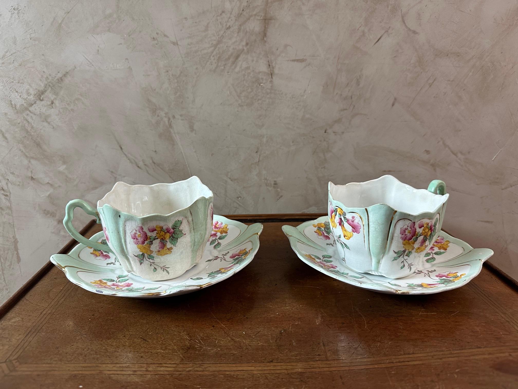 Beautiful and rare pair of tea cups or breakfast cups in French porcelain from Luneville dating from the end of the 19th century in Art Nouveau style in good condition. Stamped on the bottom. Very beautiful hand-painted floral design. Faded