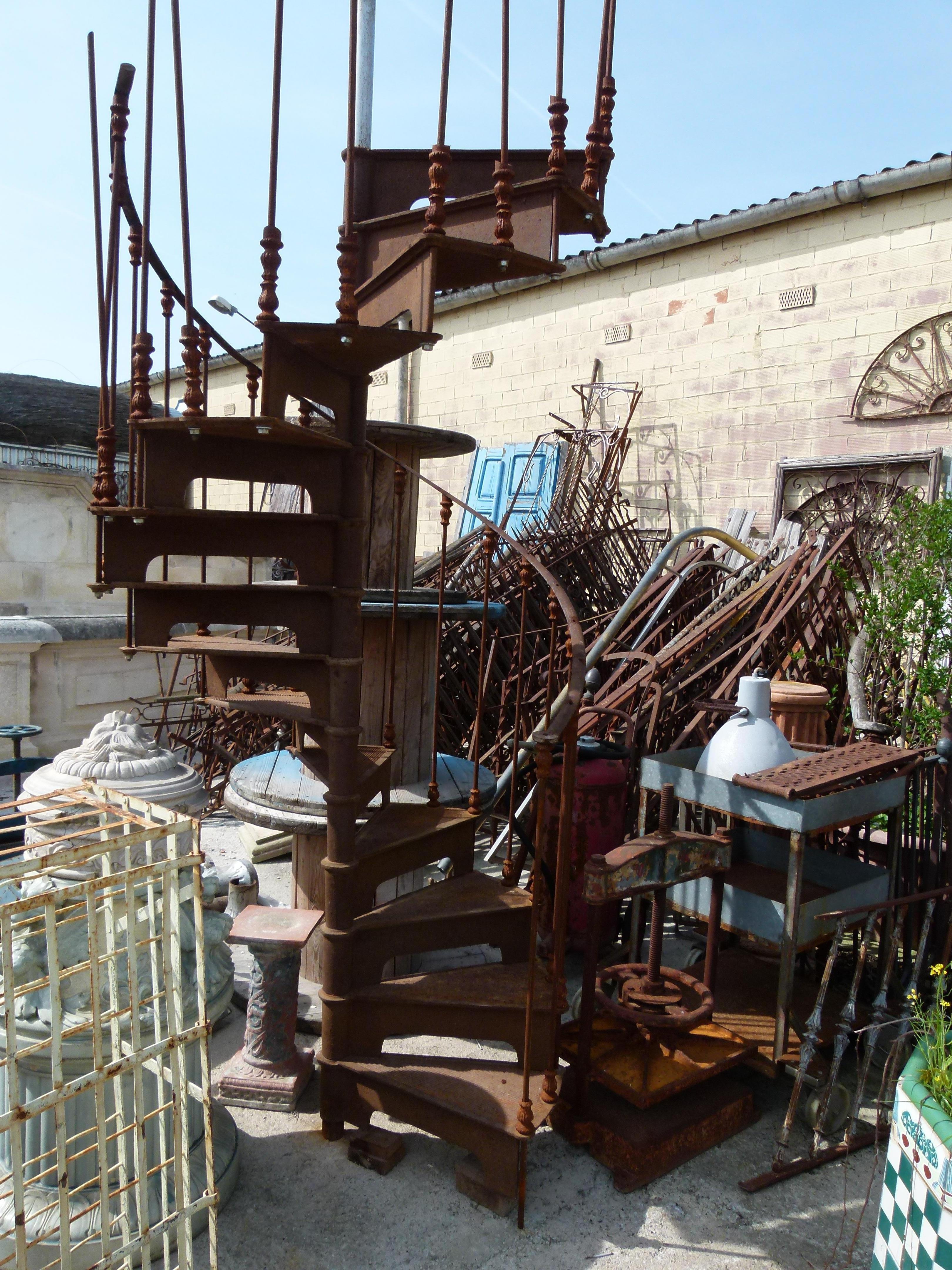 Late 19th century Art Nouveau style spiral staircase from south Spain in good condition and easy to assemble. 
Ideal for big spaces like Lofts, hotels, or other public rooms, as well as outside spaces.
The rust patina together with the Art Nouveau