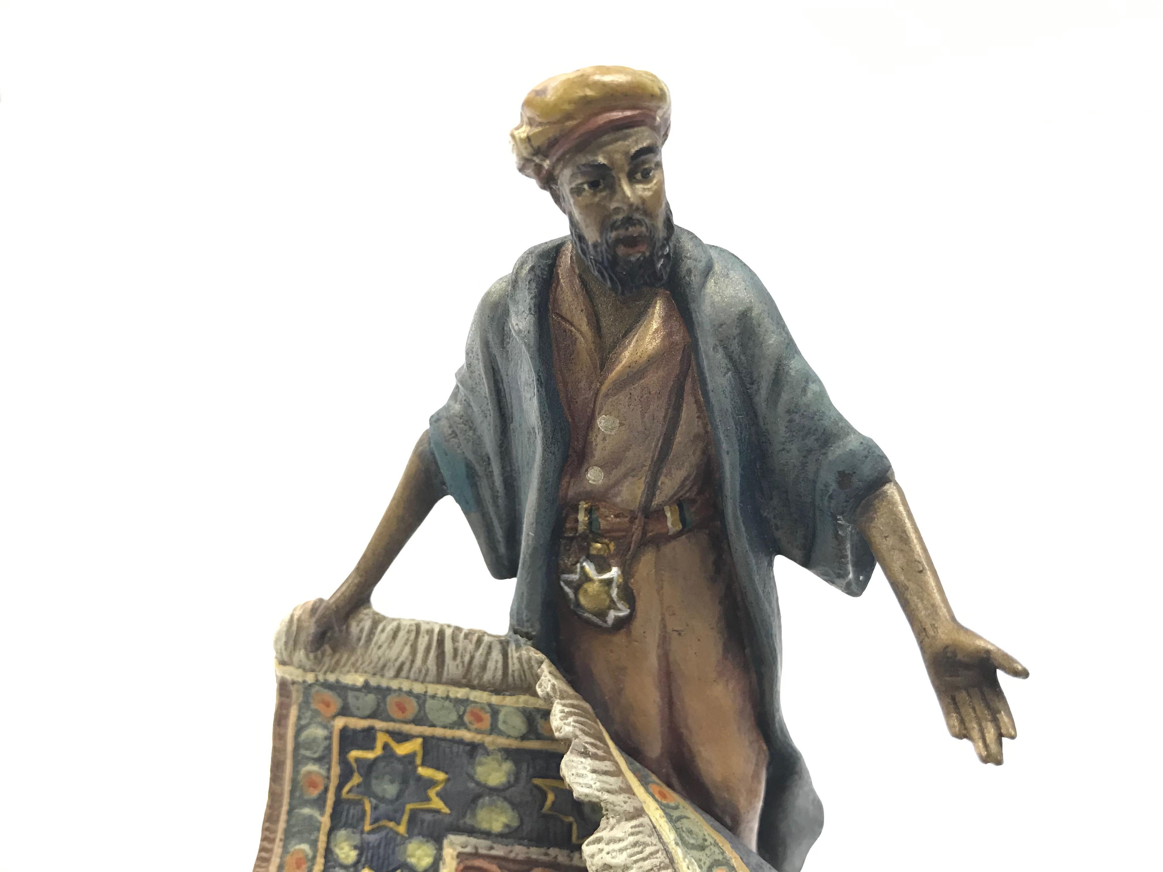 This is a very expressive cold painted Bronze of an Arab Carpet Salesman.
It has the Bergman monogram of a B inside a vase as well as what appears to be his signature.
There is the word Austria stamped in as well as a number which could be either