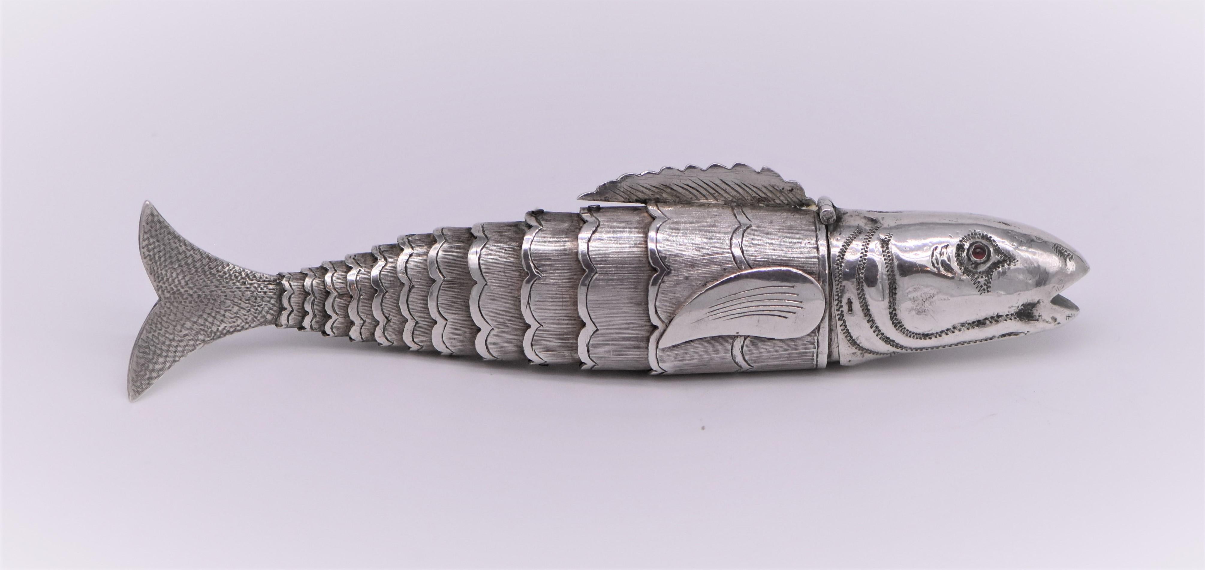 Handmade silver fish shaped spice container, circa 1900. 
Traditionally Judaica Item used for Besamim Spices. The fish is finely crafted and is made in such a way that it moves and curls like a fish in the water. The fish has a wide hinged lid at
