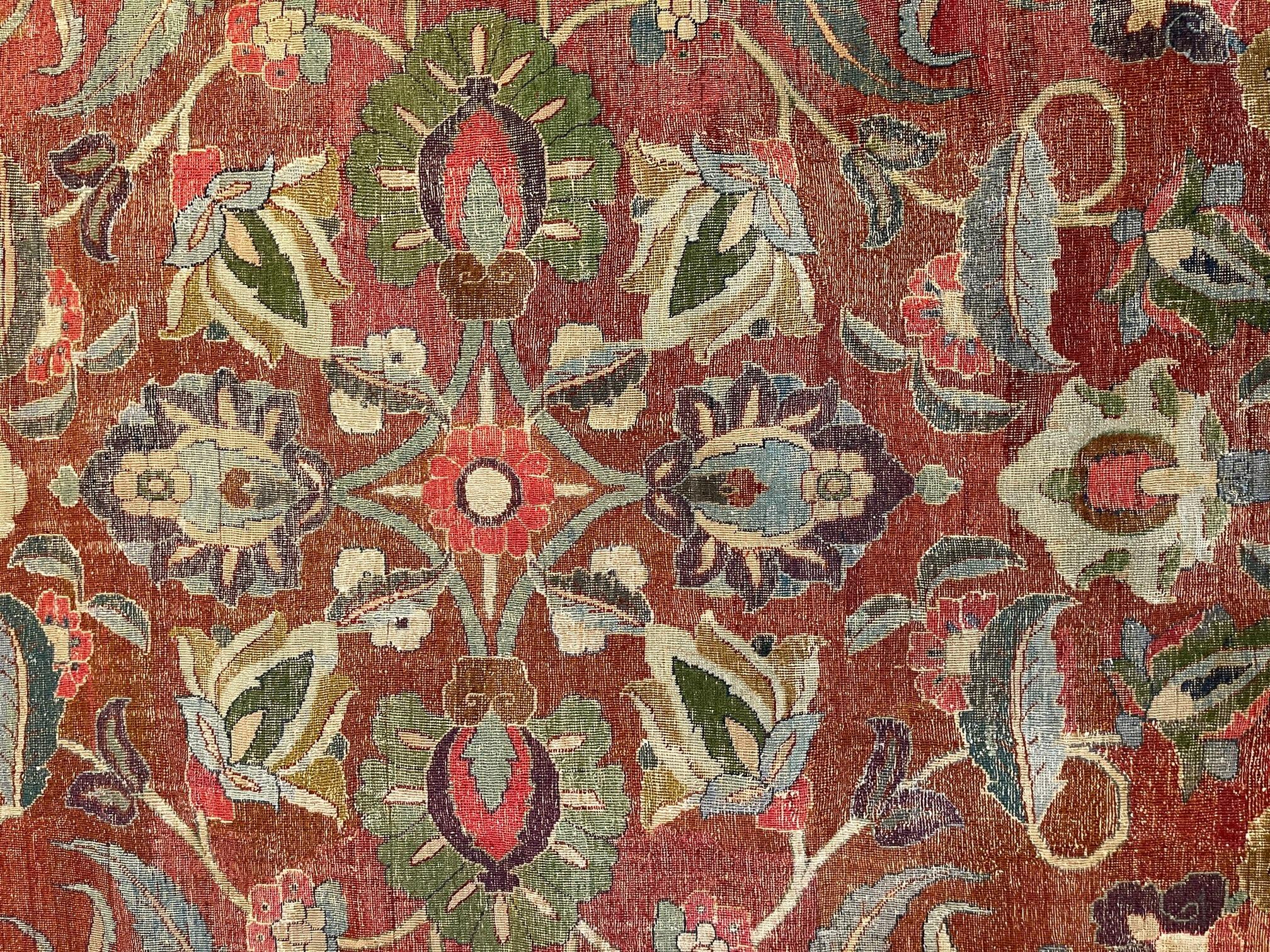 Antique Tabriz rugs are distinguished by their excellent weave and by their remarkable adherence to the classical traditions of antique Persian rug design. But they cannot be distinguished by any particular pattern or by their coloration. The city