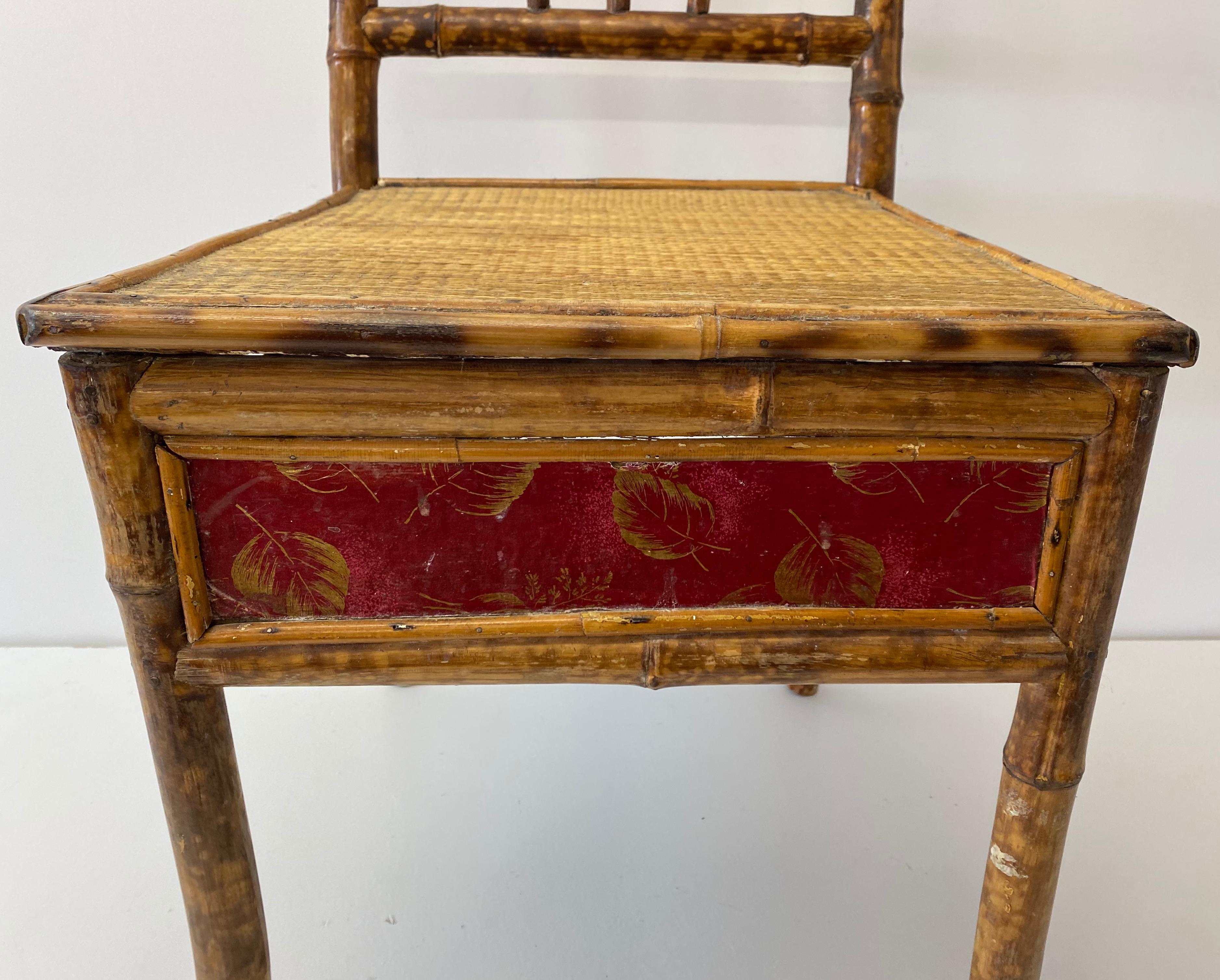 Late 19th century bamboo & cane Victorian bedroom chair, C.1890

Outstanding English Victorian bamboo chair with woven cane seat

Hand painted detail along the front and back

Eighteenth century enthusiasm for exotic furniture eventually lead