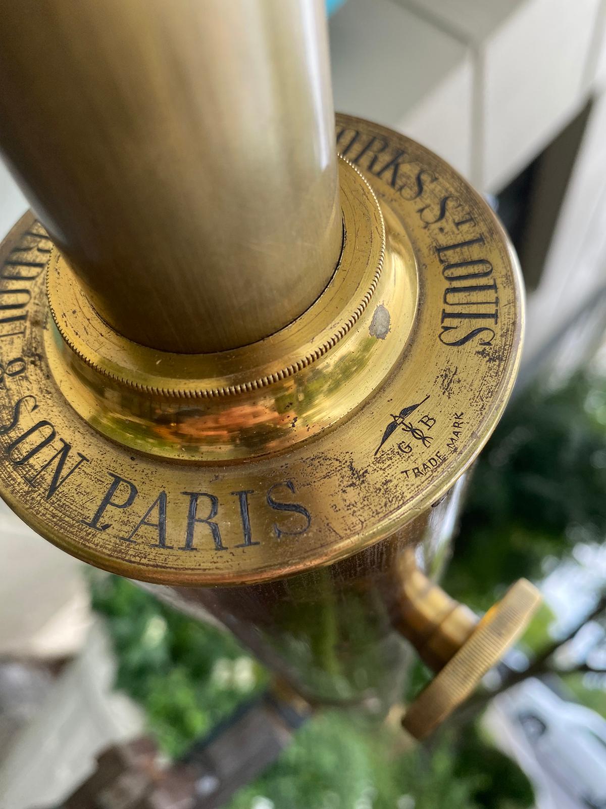 Late 19th century Words & Works St Louis, Bardou & Son Paris Brass Telescope with GB Trademark on wood tripod stand. Includes original wooden case. 
The tripod base measures 24