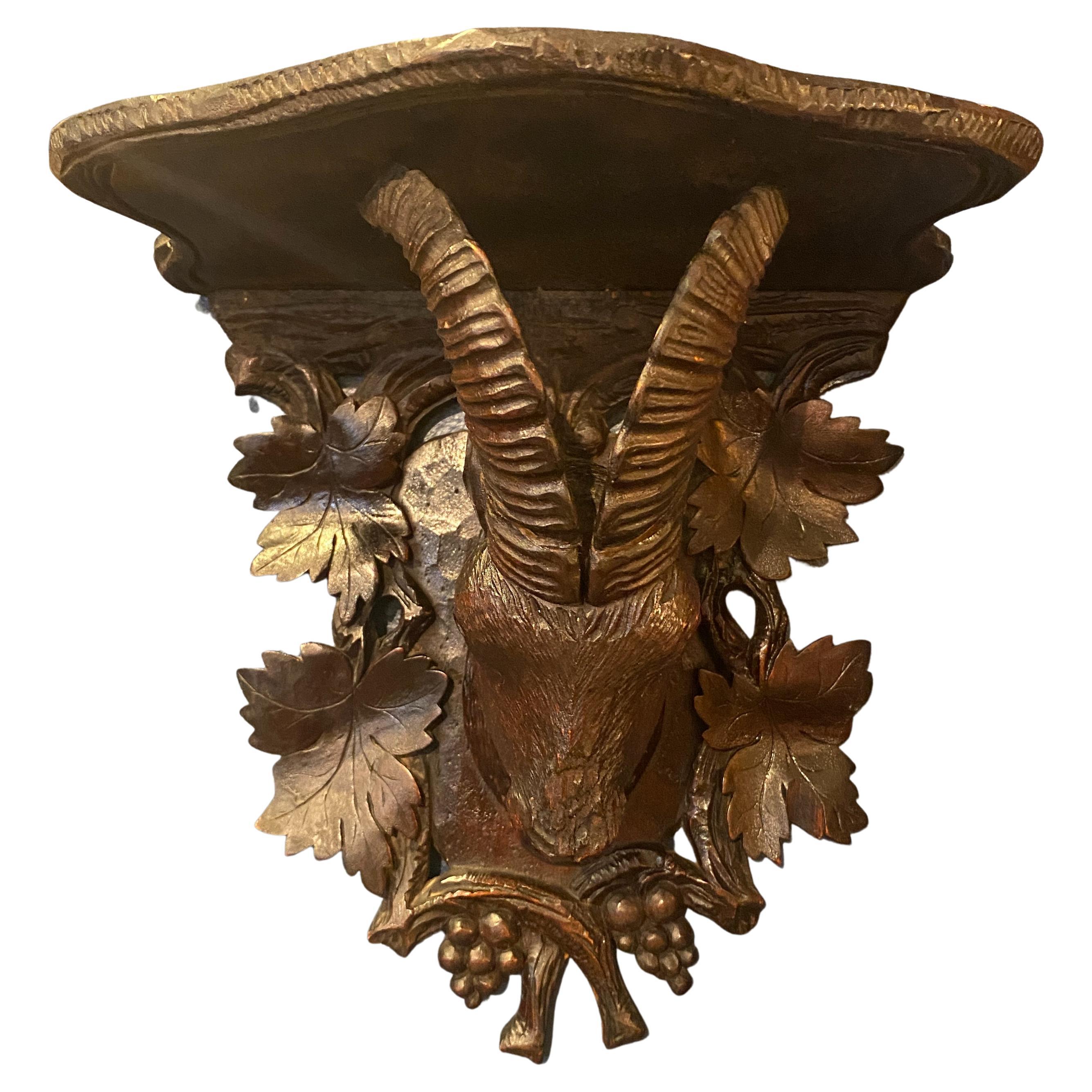 Late 19th Century Black Forest Ram Head with Leaf Motif Wood Shelf