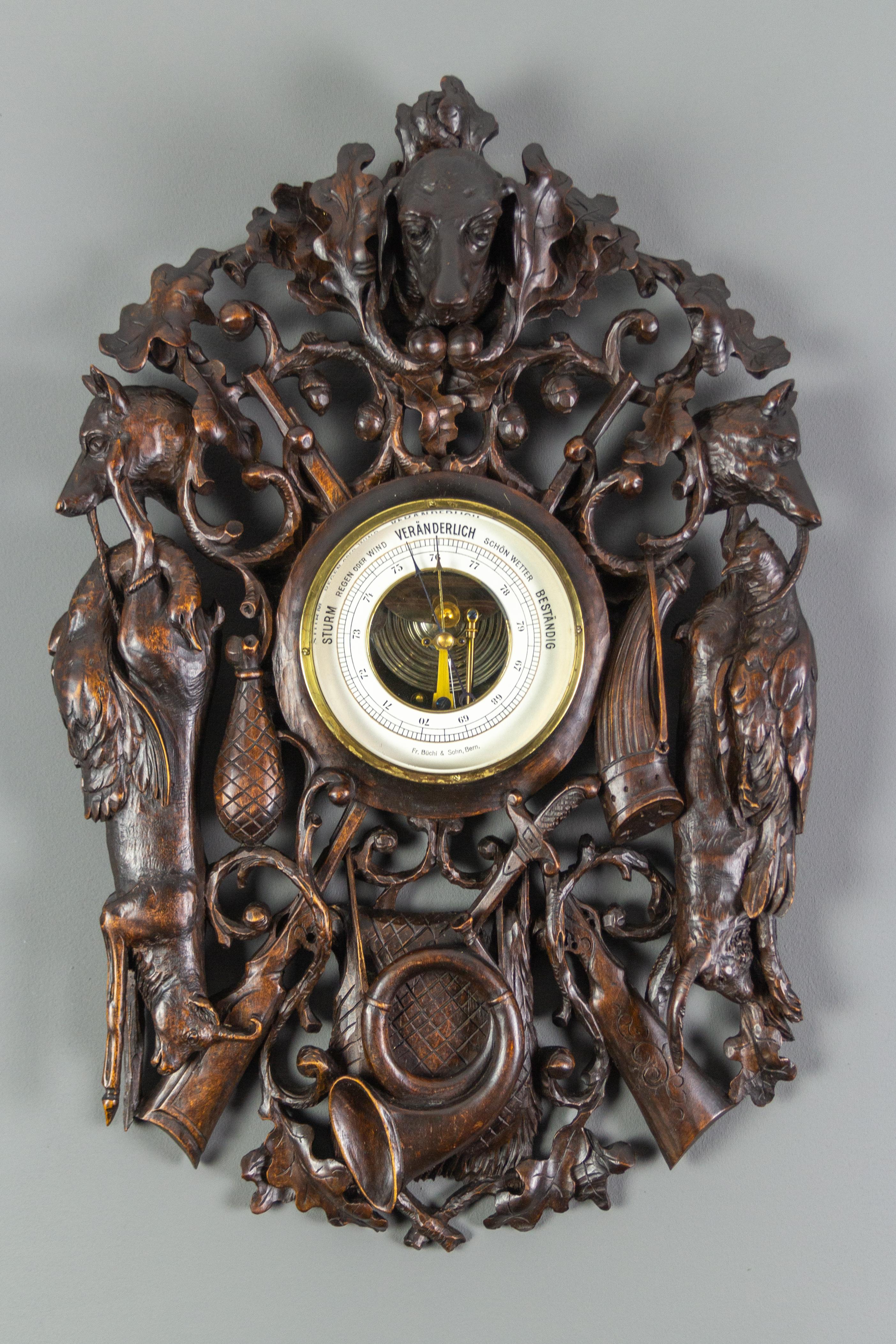 Swiss wall-mounted barometer richly decorated with elaborate hand-carved hunting trophies, Brienz, late 19th century.
This antique barometer features a background of magnificent carvings depicting detailed hunting motifs, oak leaves, and acorns. Dog