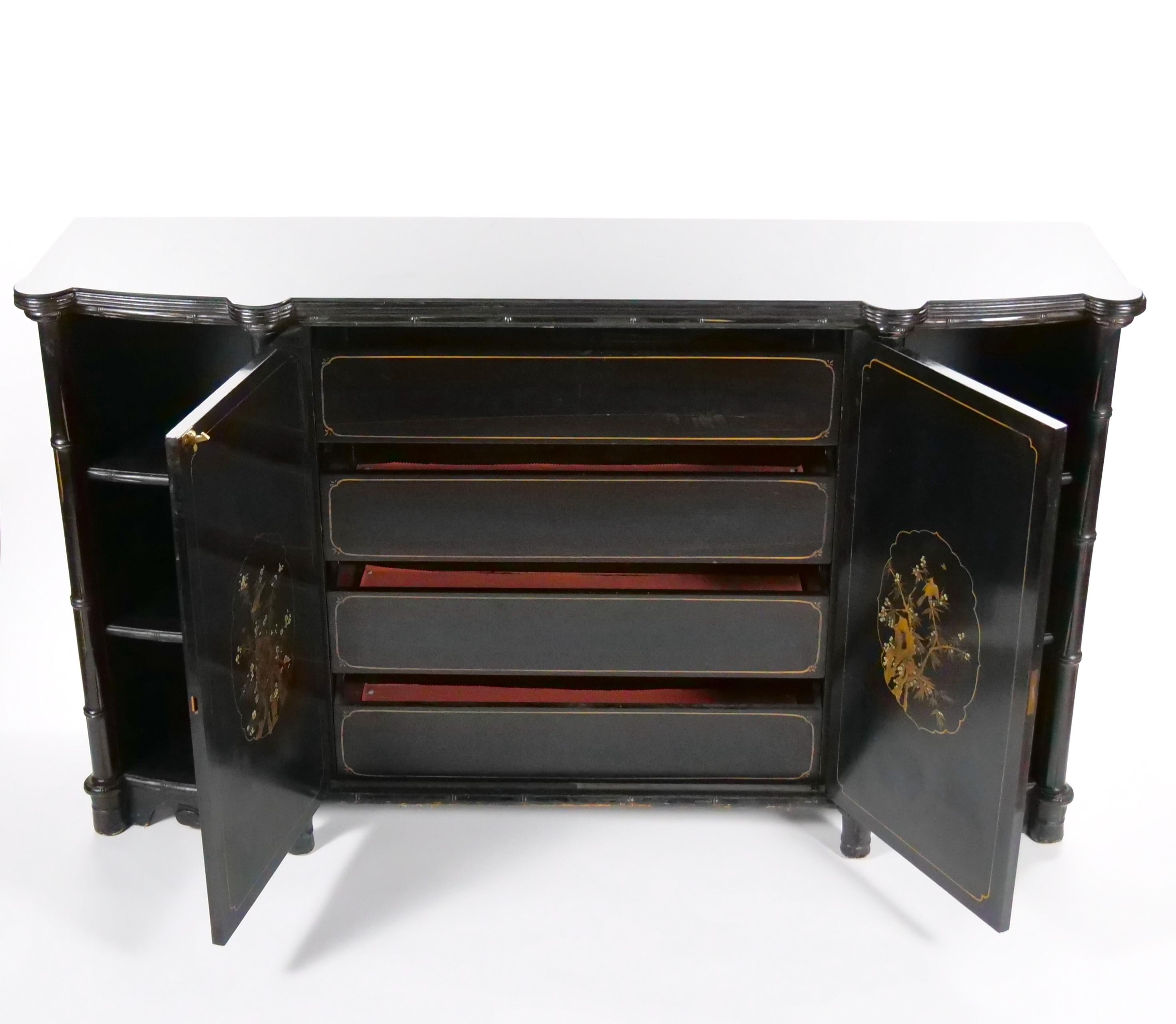 Add a touch of Eastern elegance to your space with this stunning antique black lacquered chinoiserie credenza, a true statement piece that blends traditional craftsmanship with intricate hand-painted details. The beautifully executed chinoiserie