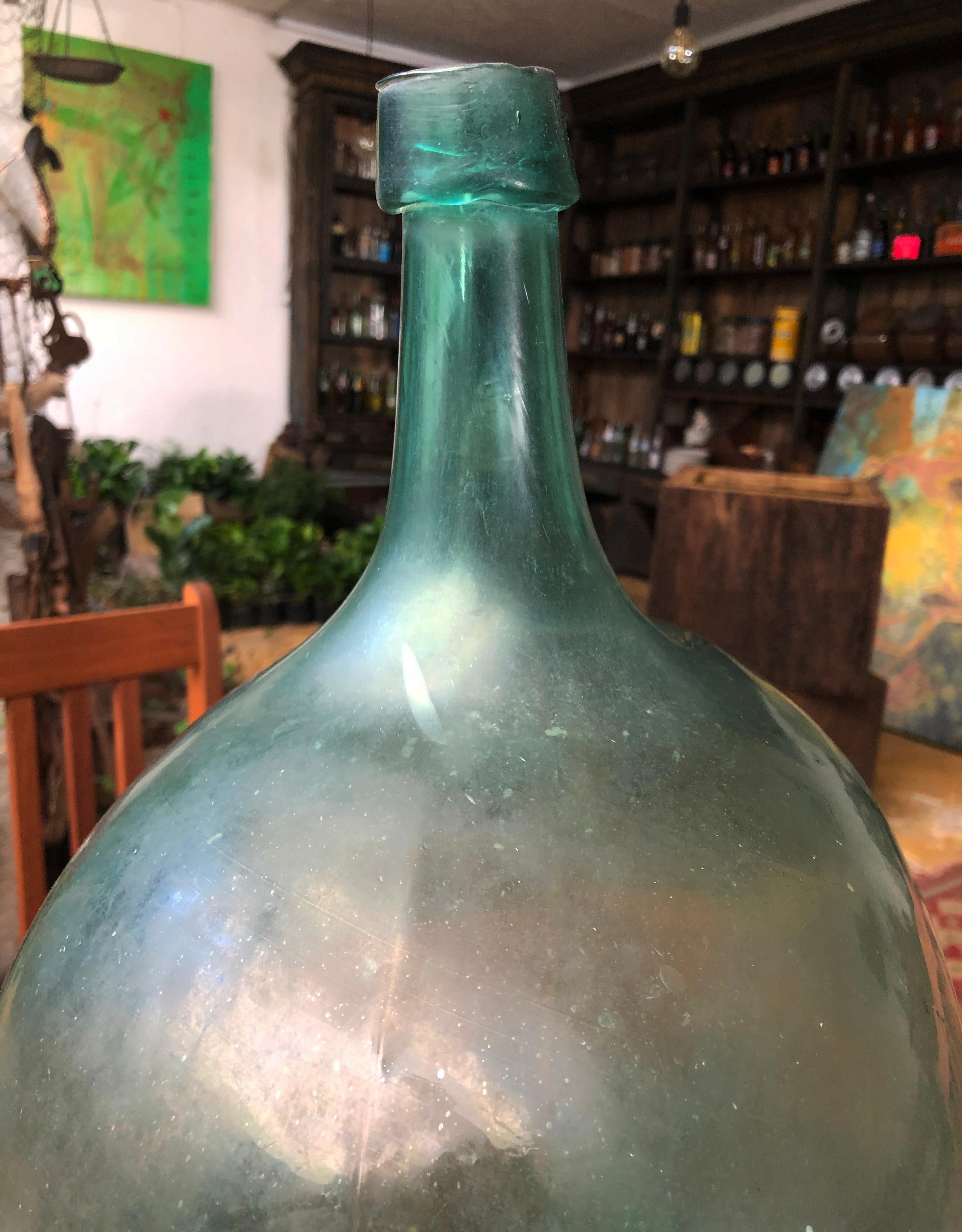 Rustic Late 19th Century Blown Glass Light Blue Demijohn Bottle Found in México