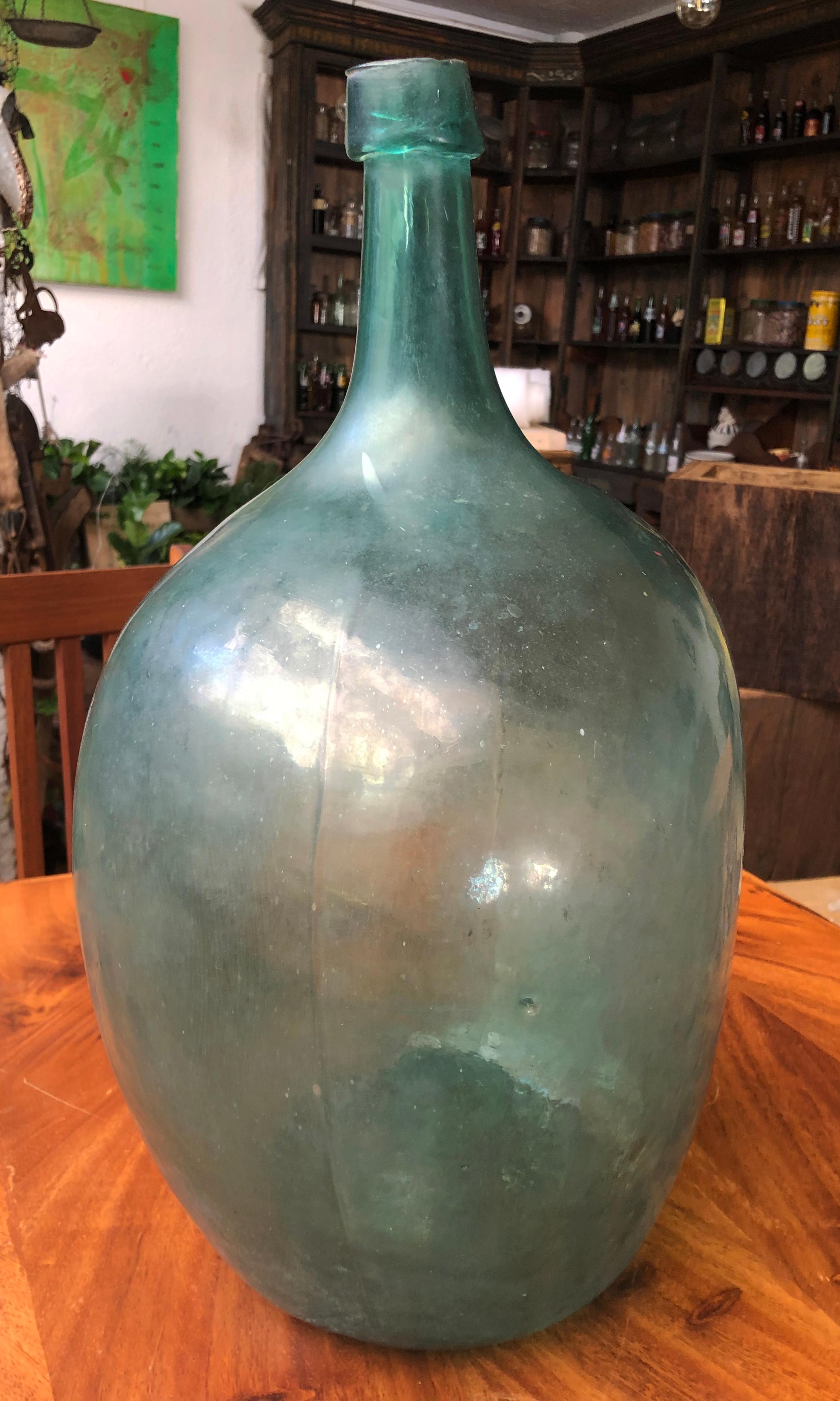 Mexican Late 19th Century Blown Glass Light Blue Demijohn Bottle Found in México