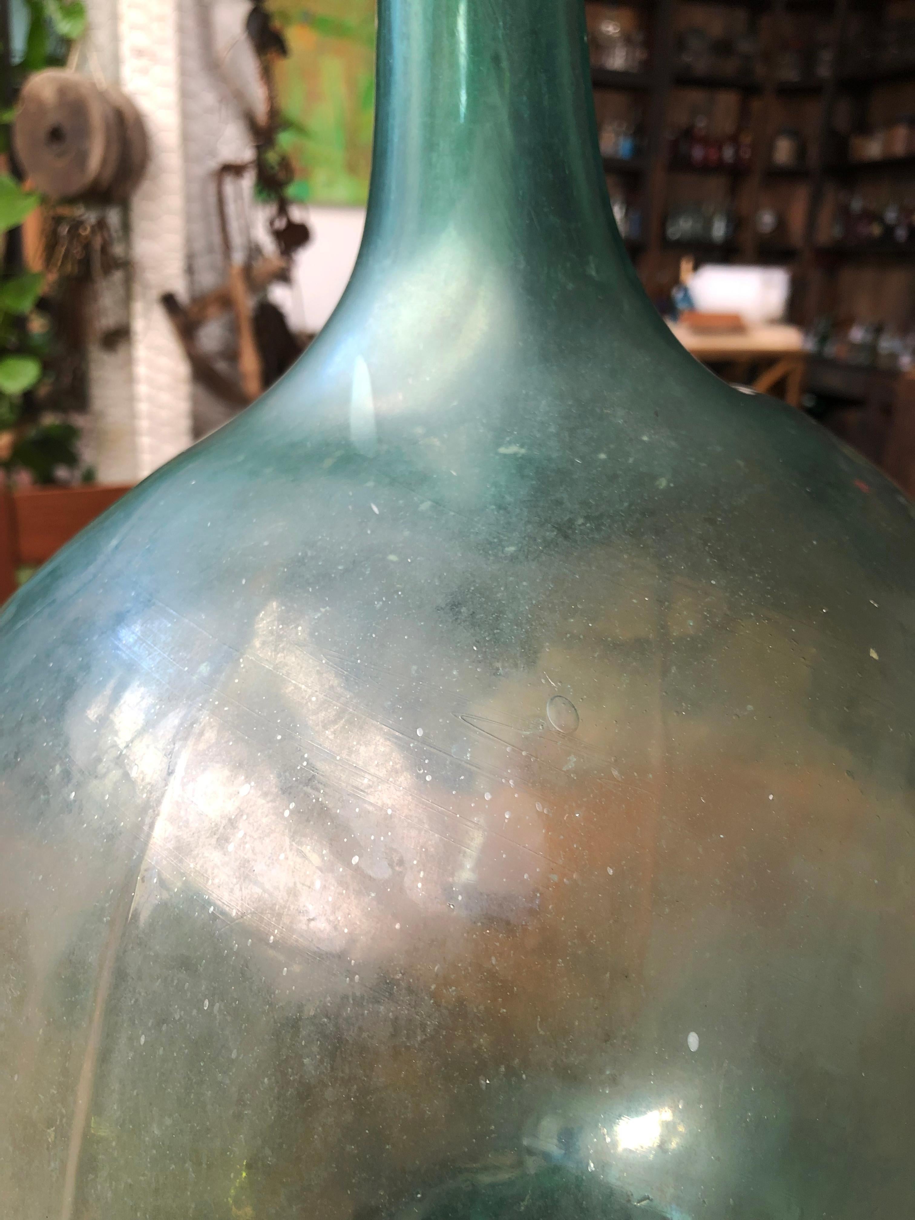 Hand-Crafted Late 19th Century Blown Glass Light Blue Demijohn Bottle Found in México