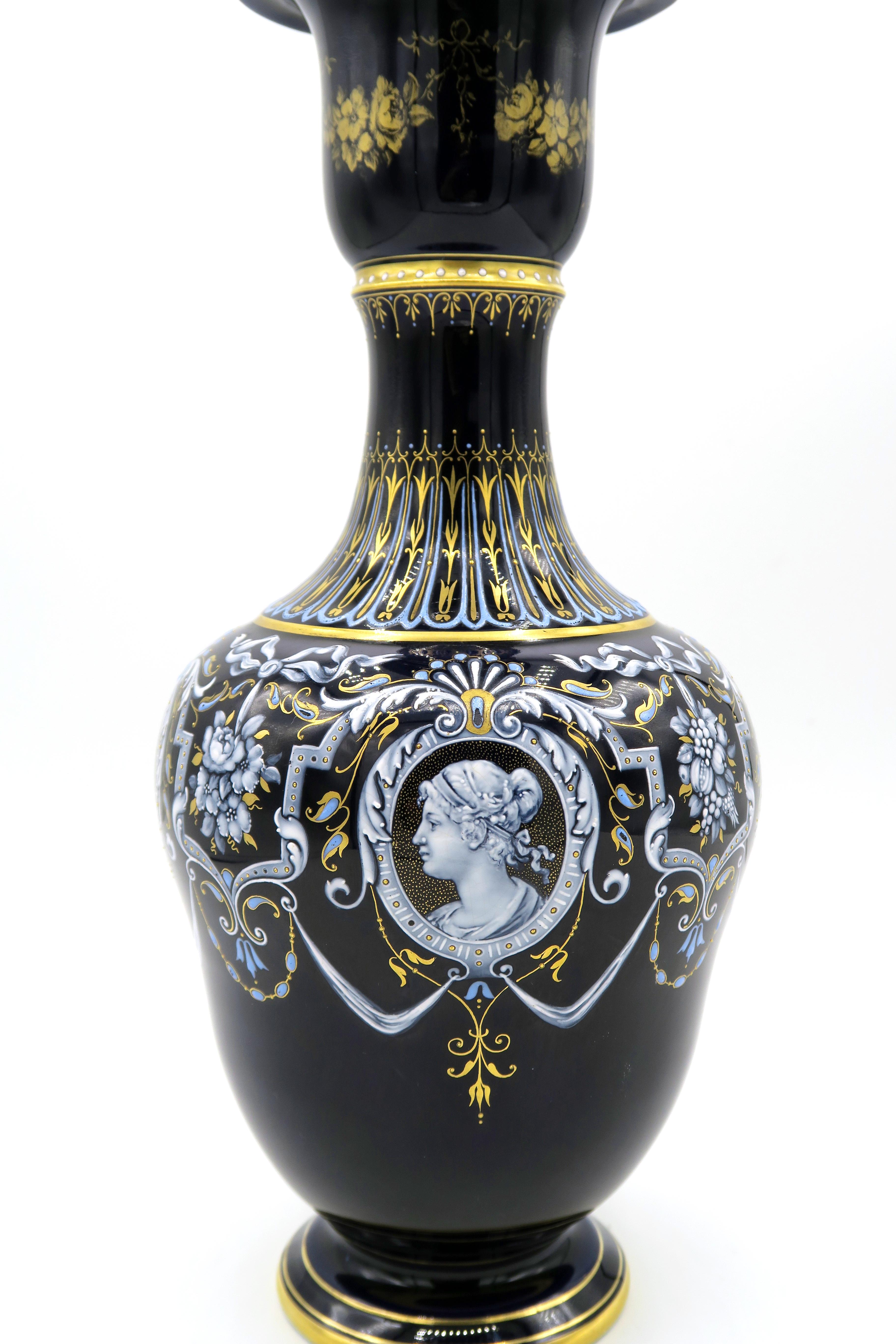 Late 19th century blue Meissner narrow neck vase with elegant lady portrait 
Surrounded by four portraits of women, flowers.
Covered with ribbon ornaments in 