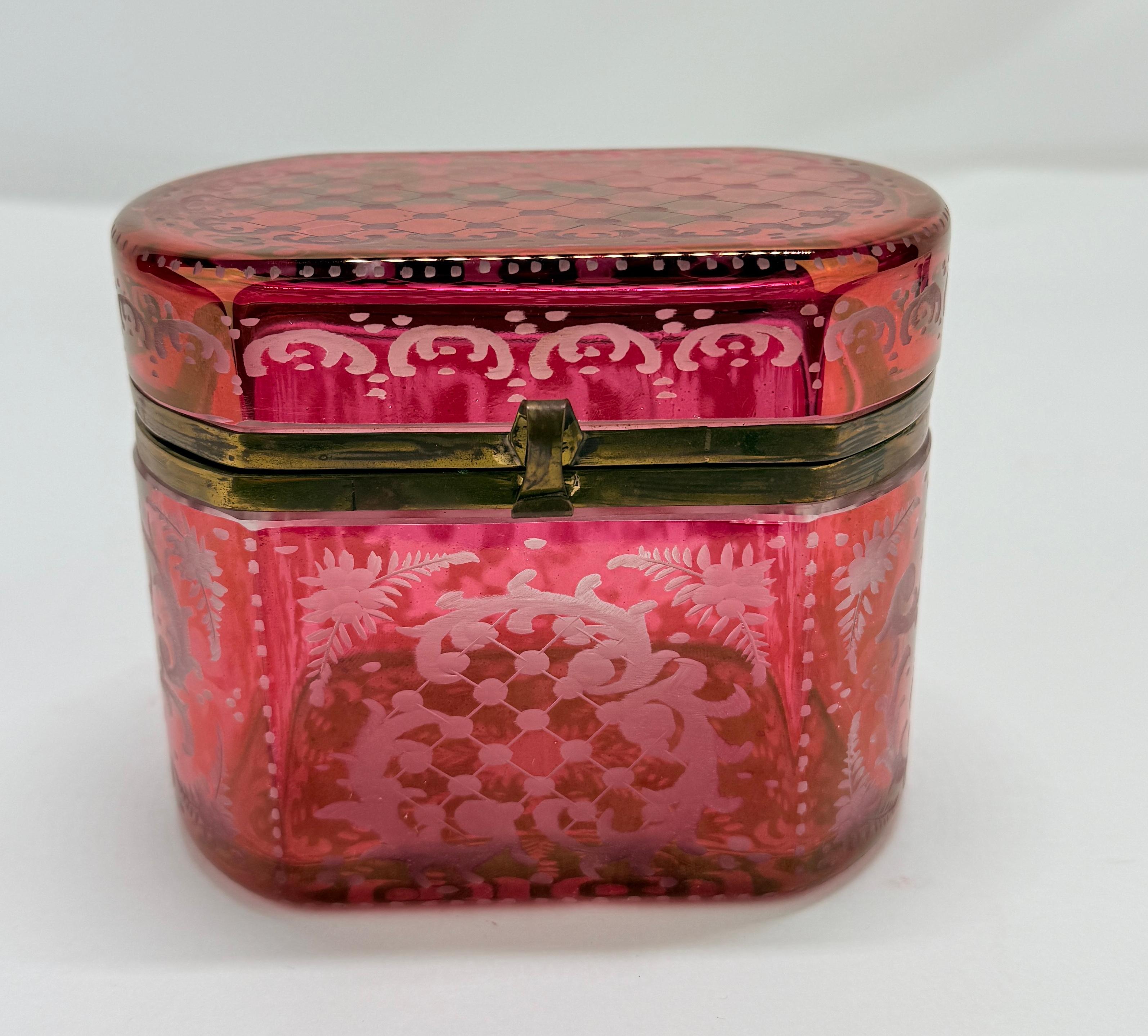Late 19th Century, Bohemian Cranberry Overlay & Gilt Bronze Hinged Casket Box

A richly ornamented Bohemian casket box, dating to the latter half of the 19th century, of ovoid rectangular form with cut and acid-etched decoration to a deeply colored