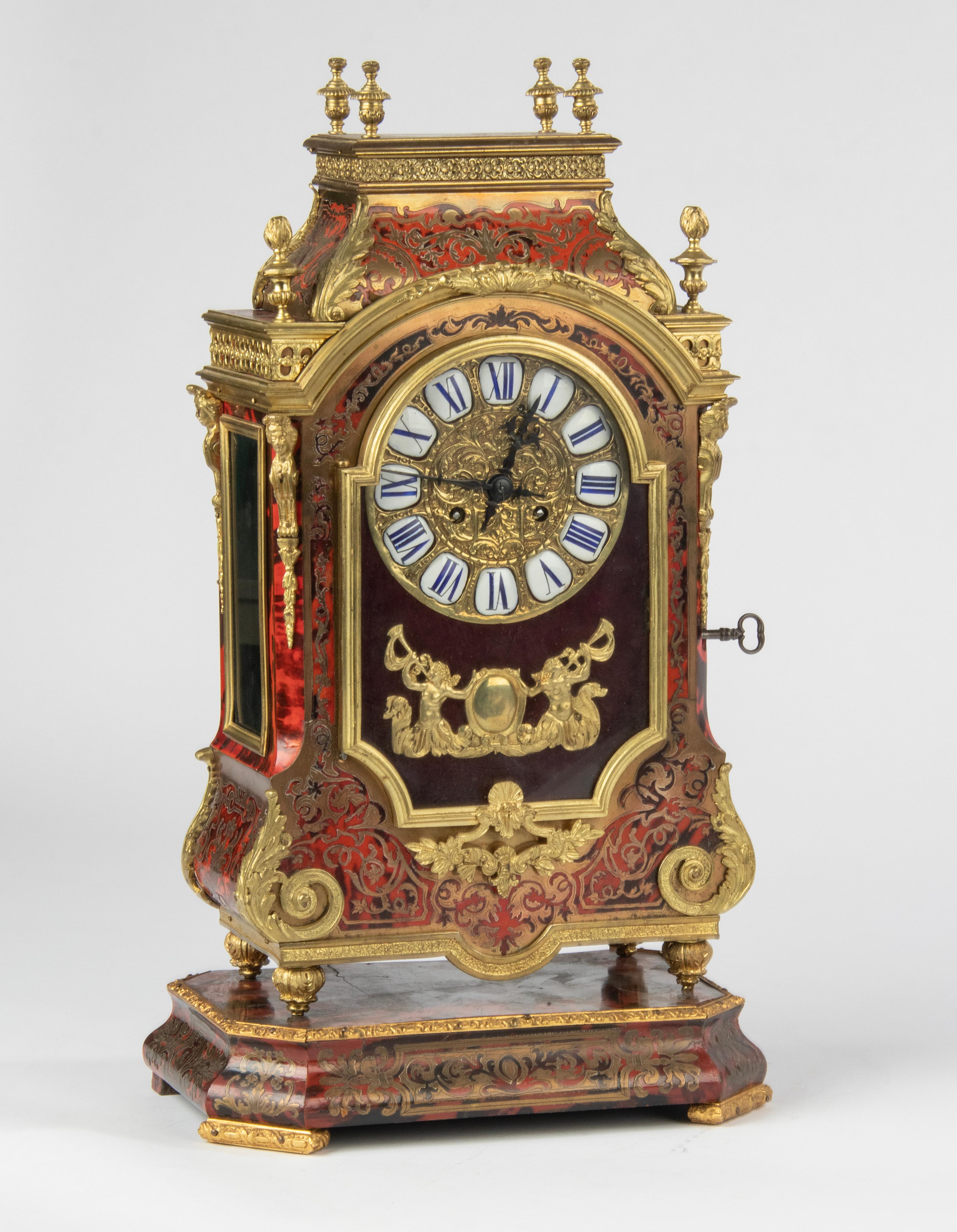 A fine quality French Napoleon III mantle clock in the style of André-Charles Boulle, with a matching console. This model also called 