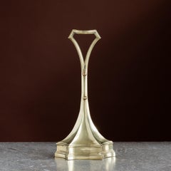 Late 19th century brass door porter by Tonks