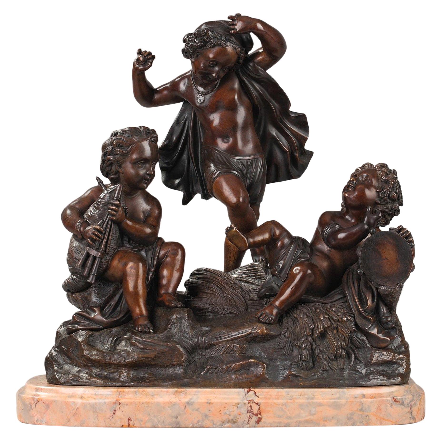Bronzegruppe des späten 19. Jahrhunderts:: musizierende Amoretten im Angebot