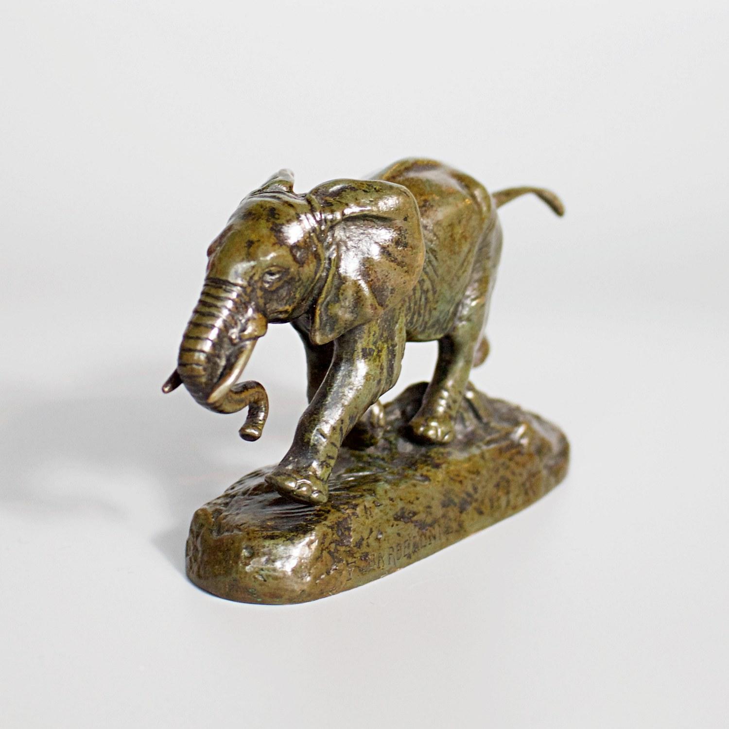 A late 19th century bronze sculpture by Antoine-Louis Barye (1795-1875) of a small proportioned, charging African Elephant. Rich green patination and hand chased detail. Signed Barye and inscribed F Barbedienne.

Dimensions: H 9.4cm, W 6.5cm, D