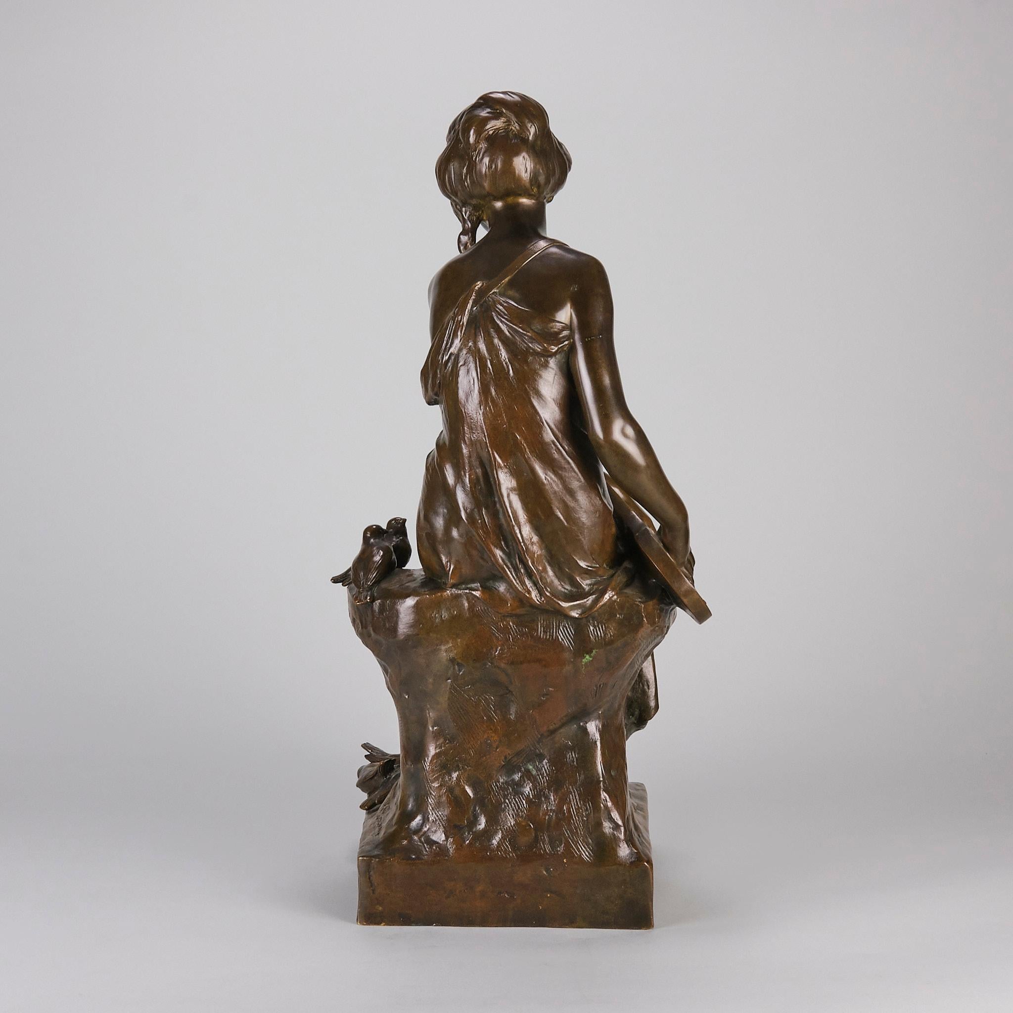 Bronzo Scultura in bronzo della fine del XIX secolo intitolata Femme avec Oiseau di Maurice Bouval in vendita