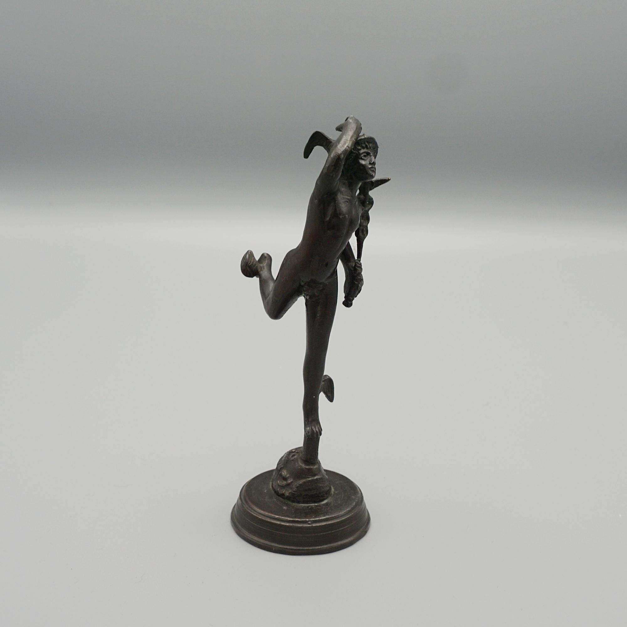 A late 19th century bronze figure depicting Hermes in full stride. Unsigned. 