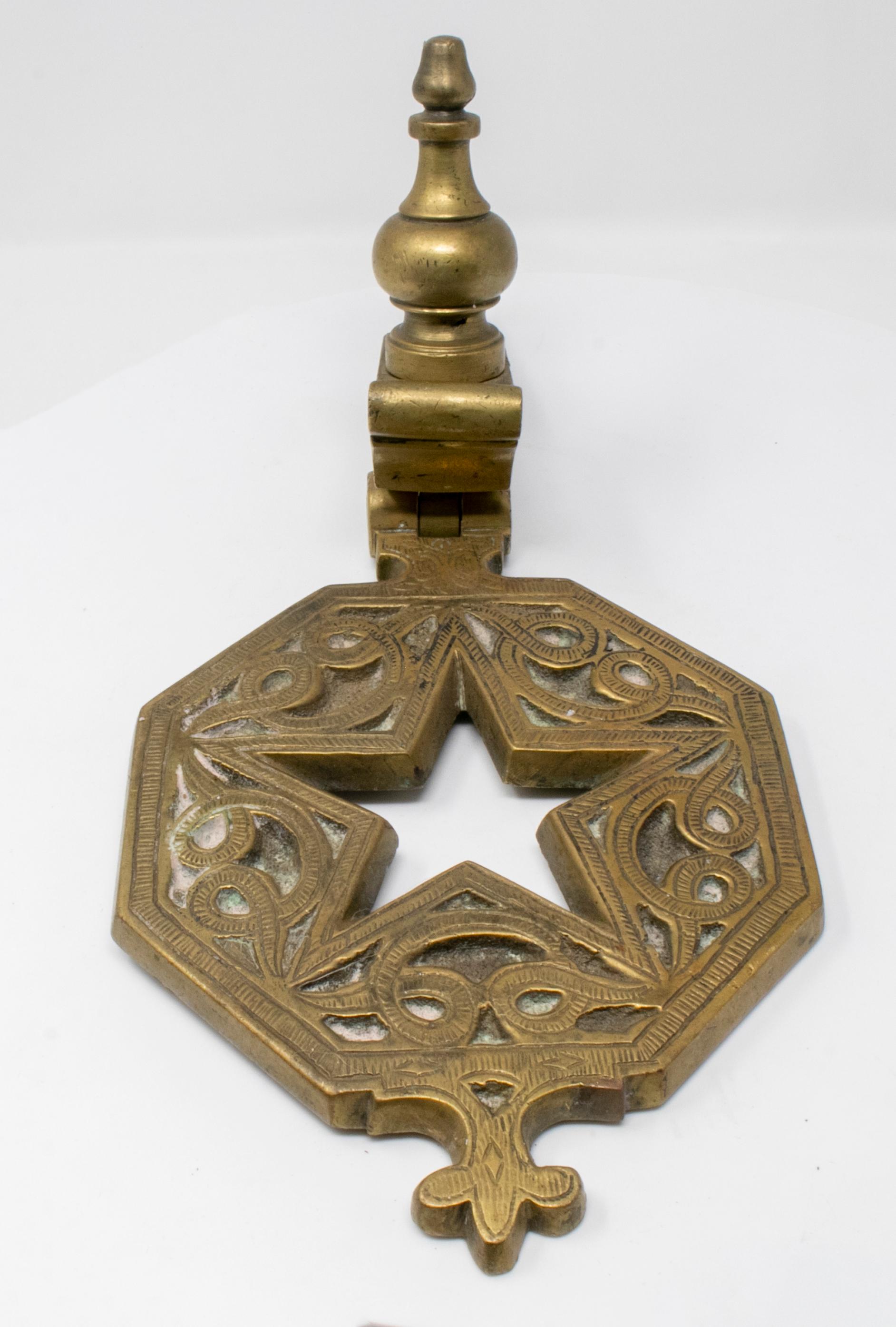 Late 19th century bronze star shaped door knock.