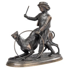 Sculpture en bronze de la fin du XIXe siècle  Garçon jouant avec un Whippet par Jules Moigniez
